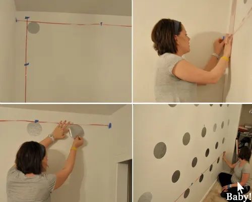 Lining Up DIY Polka Dots on Wall