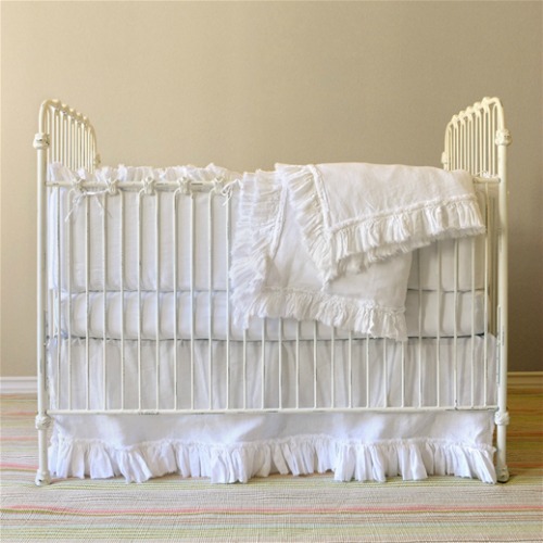 white metal baby crib