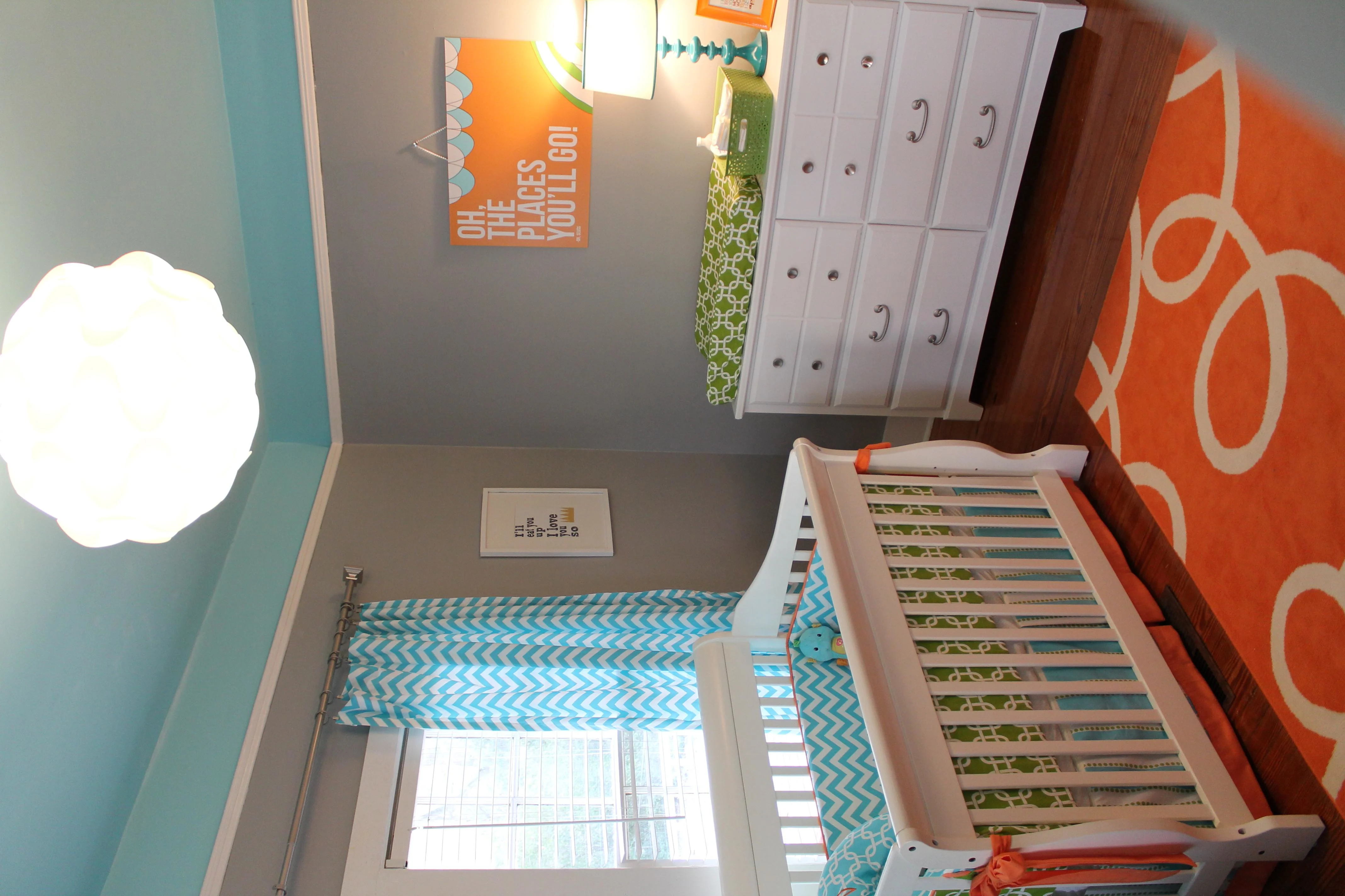 Bright and Modern Orange, Turquoise, Gray Nursery Crib View