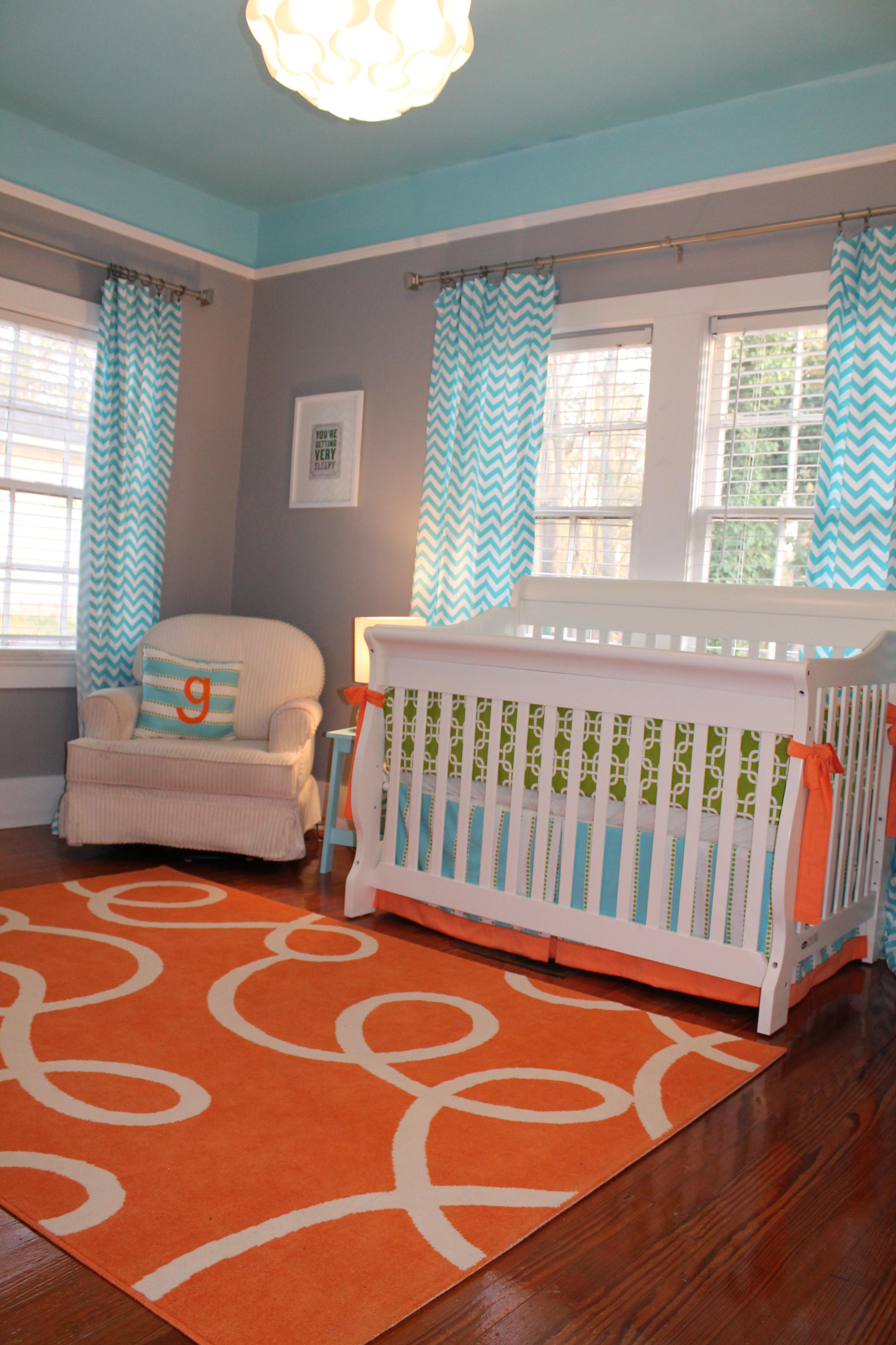 Bright and Modern Orange, Turquoise, Gray Nursery with Orange Rug