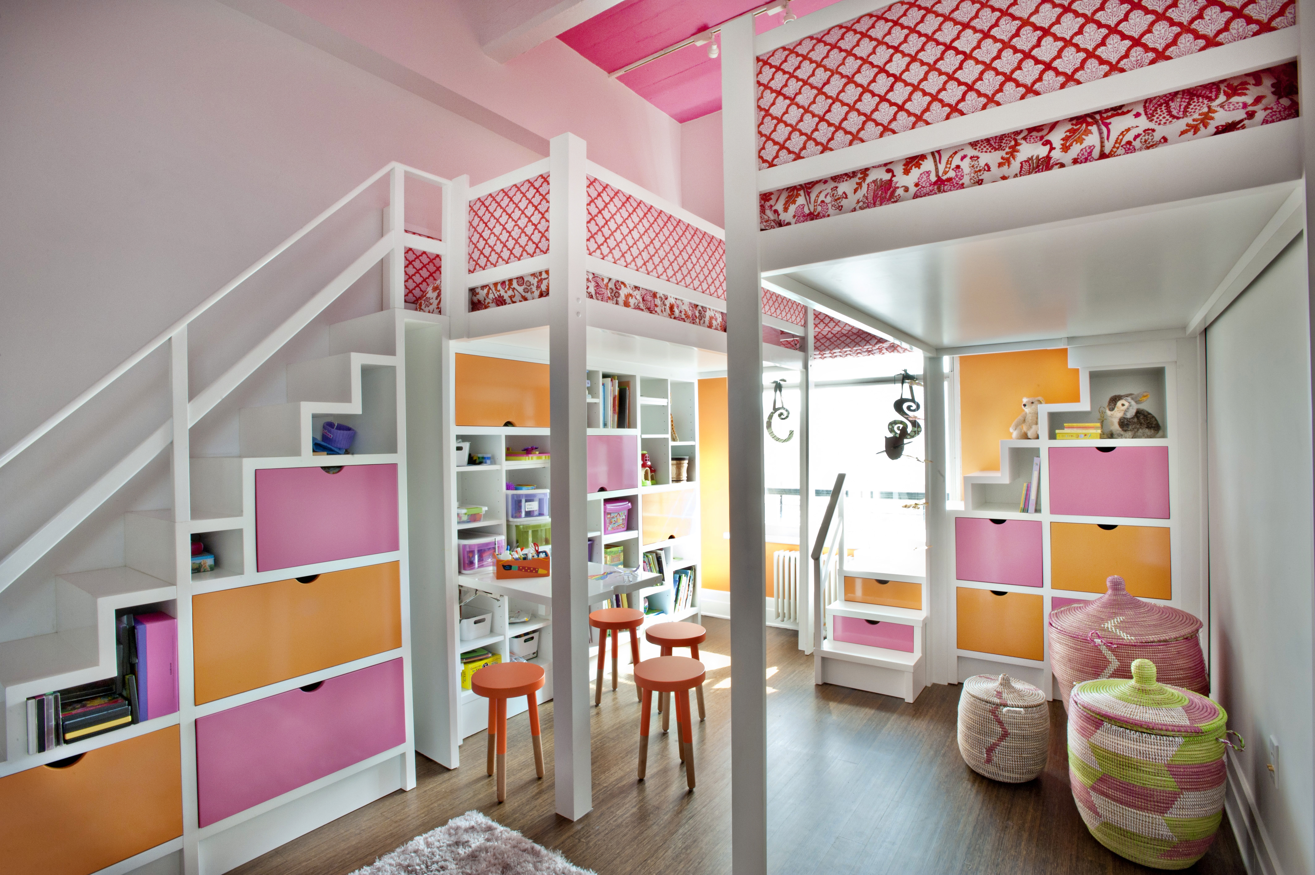 lofted beds in girls NYC pink and orange shared room