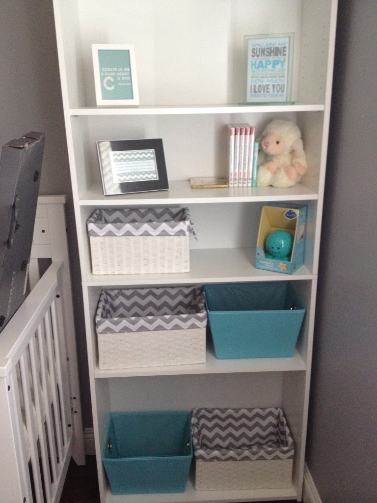 white bookshelf baby room