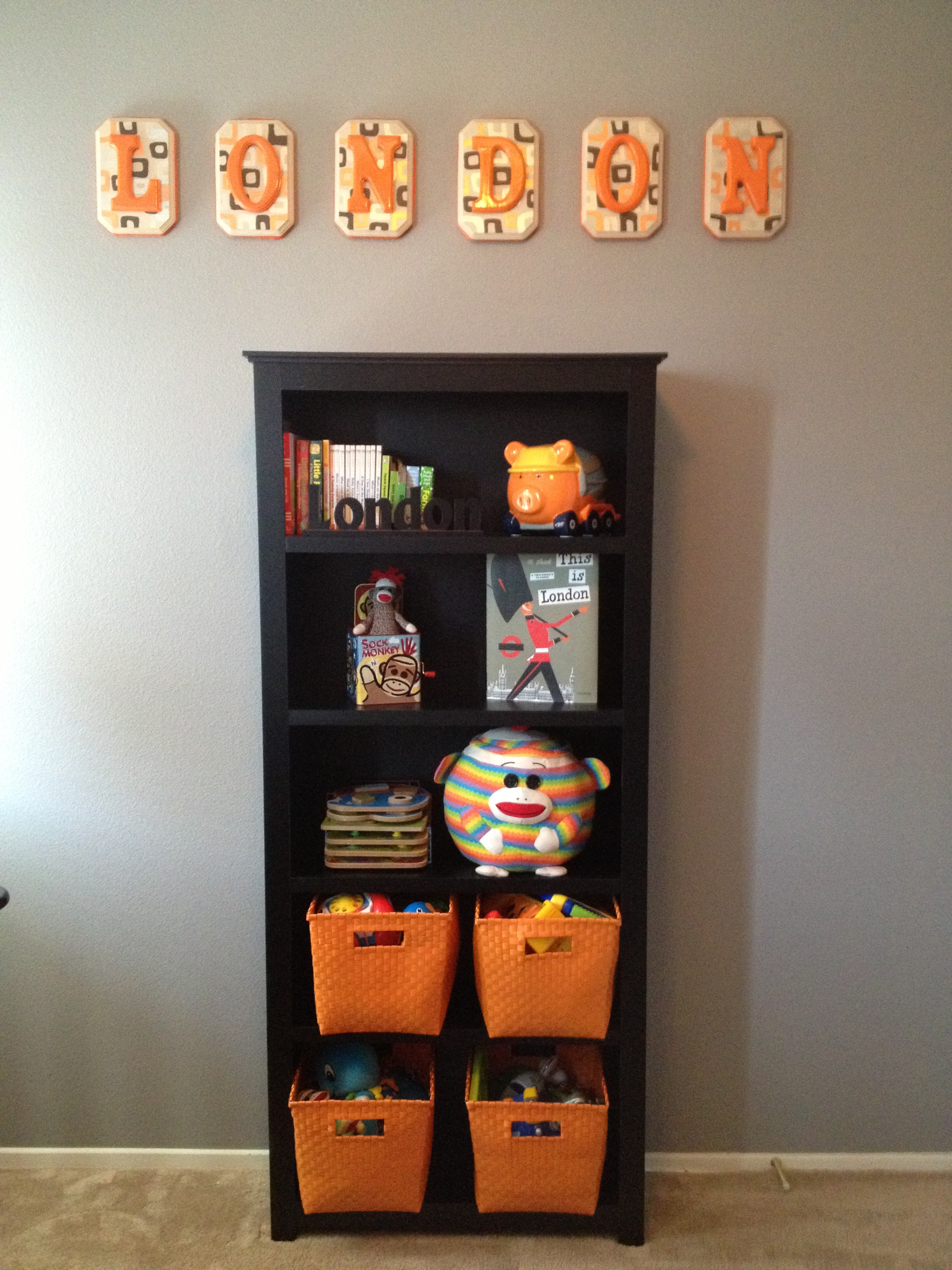 Boy Gray and Orange Nursery Storage Space