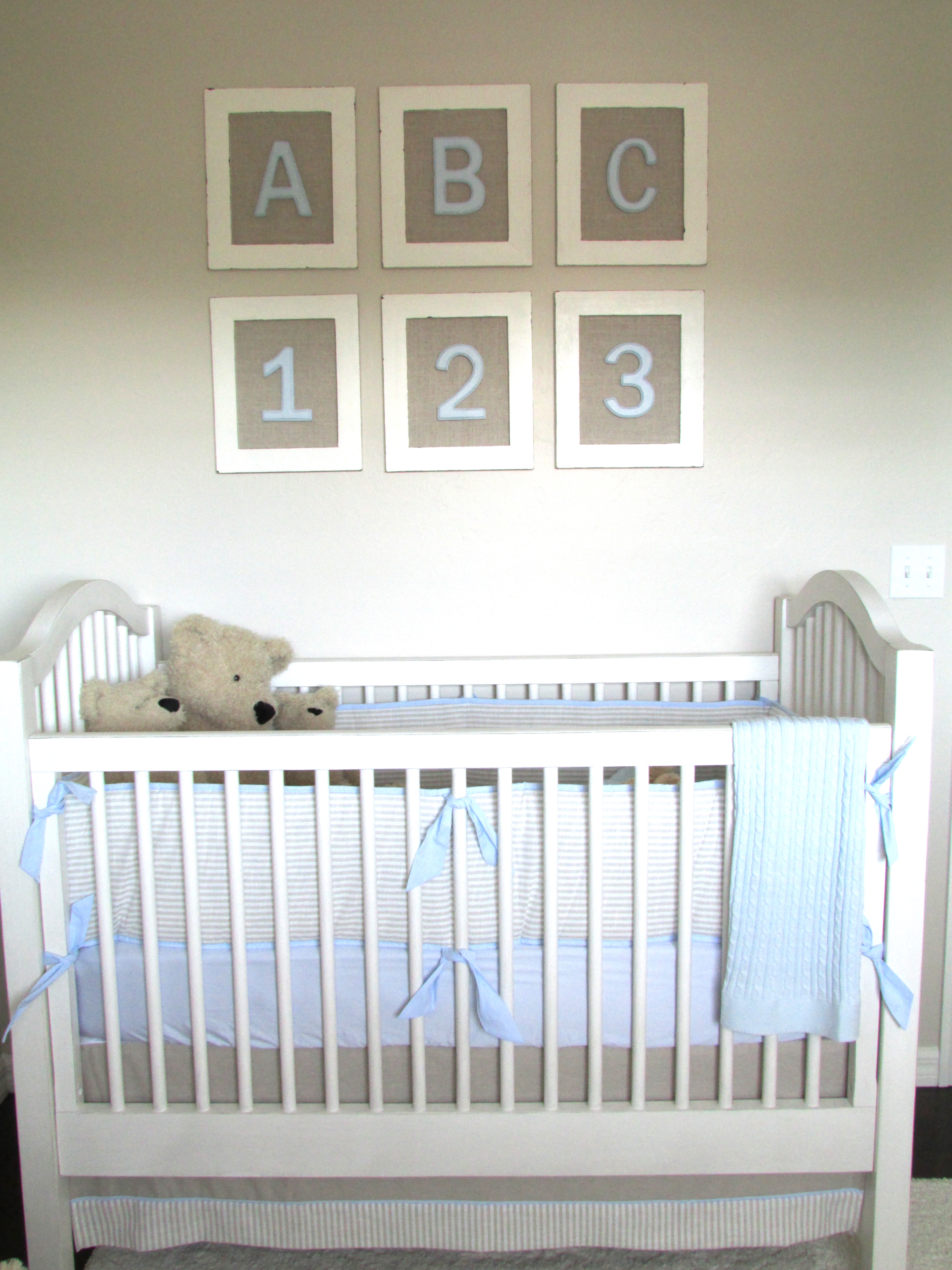 Gray Baby Boy Nursery Crib and Wall Art