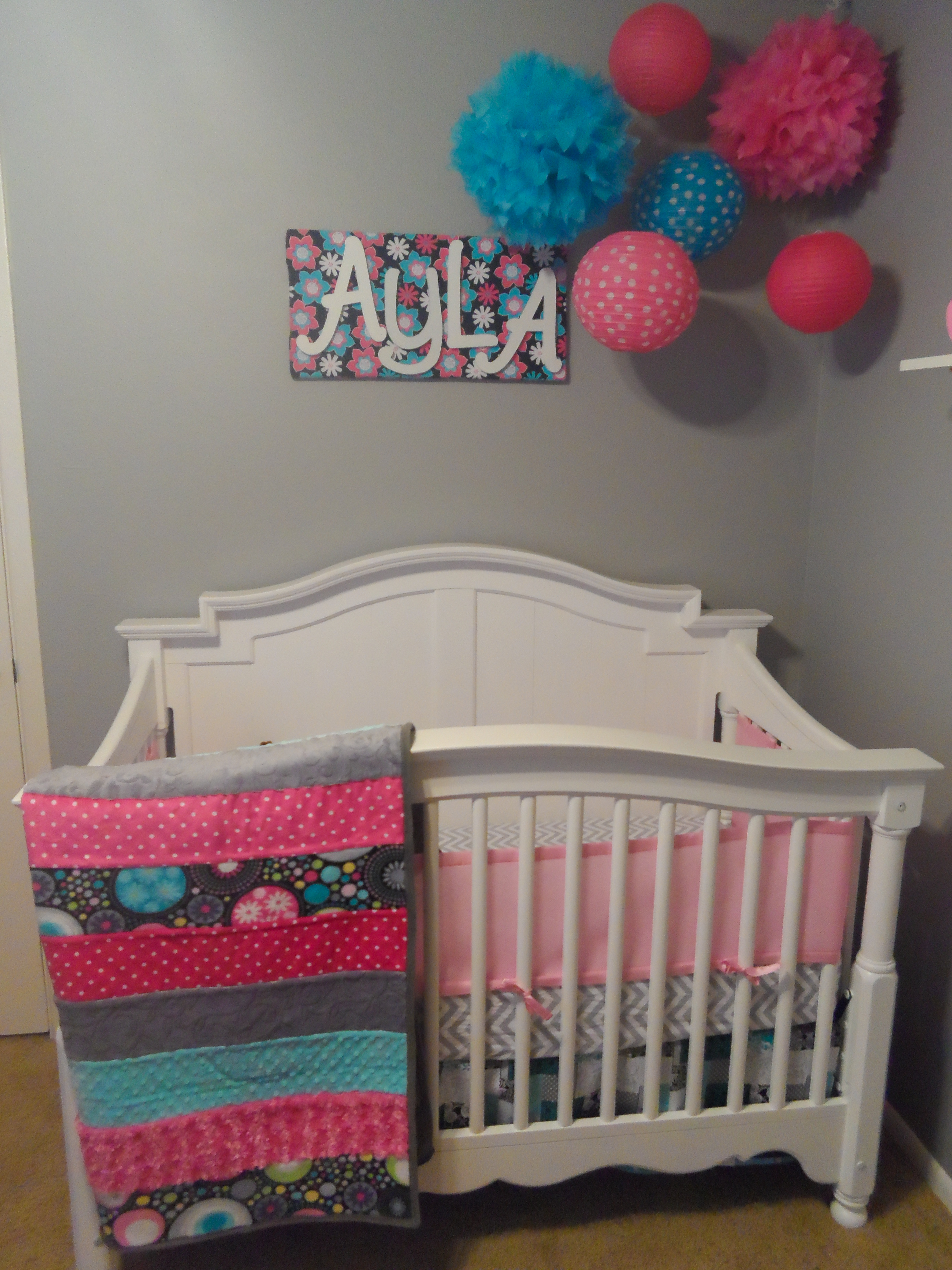 Girl Gray, Pink, and Turquoise Nursery Crib View