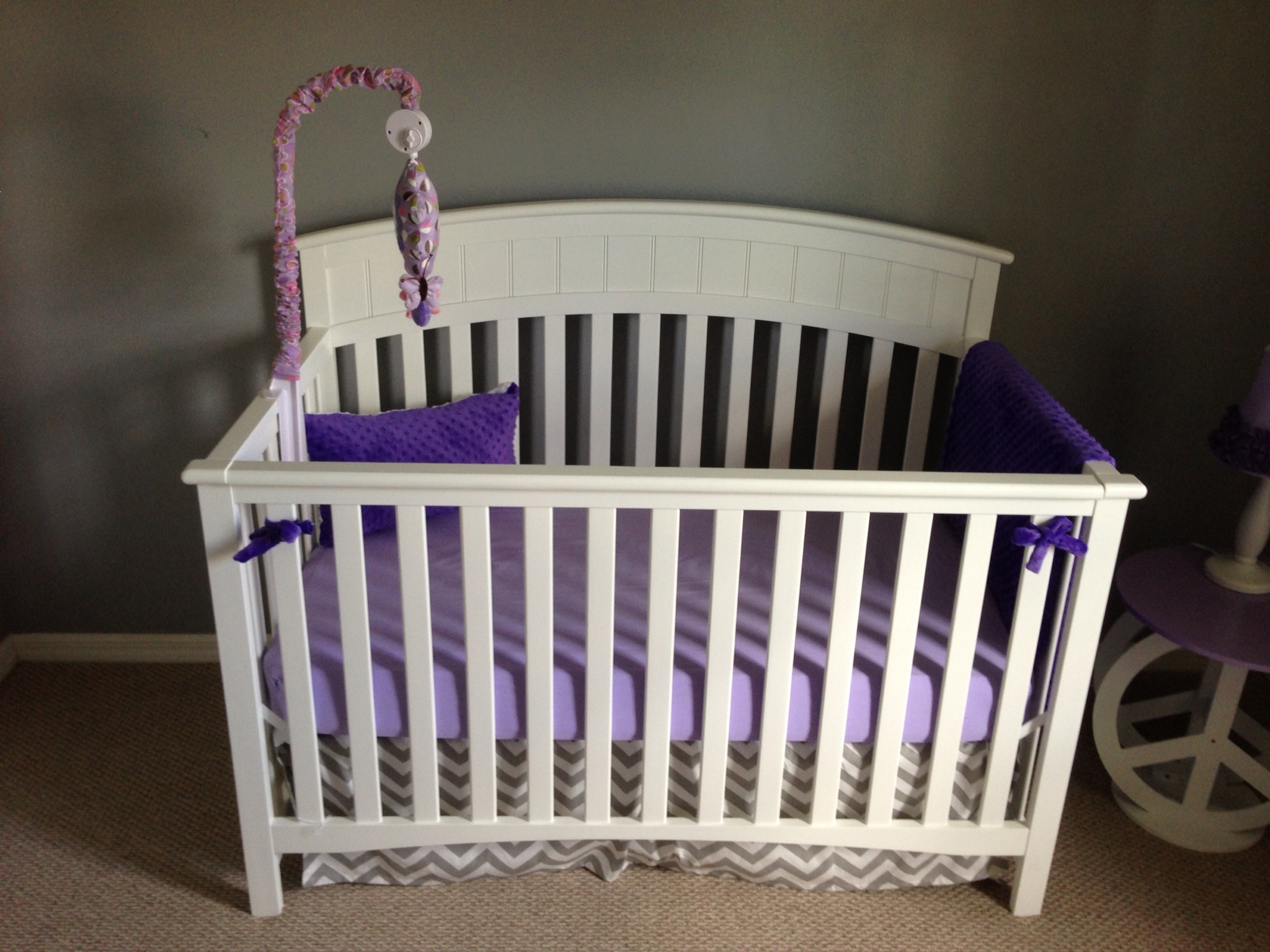 Gray and Purple Nursery Crib View