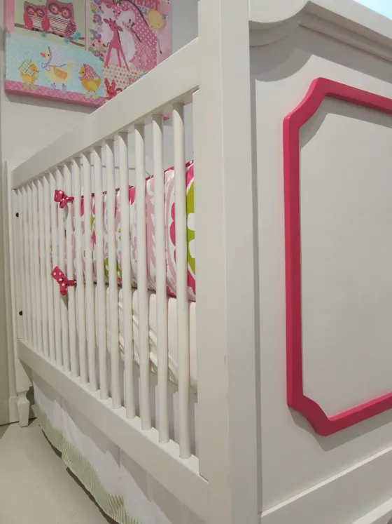 Hot pink and white baby crib