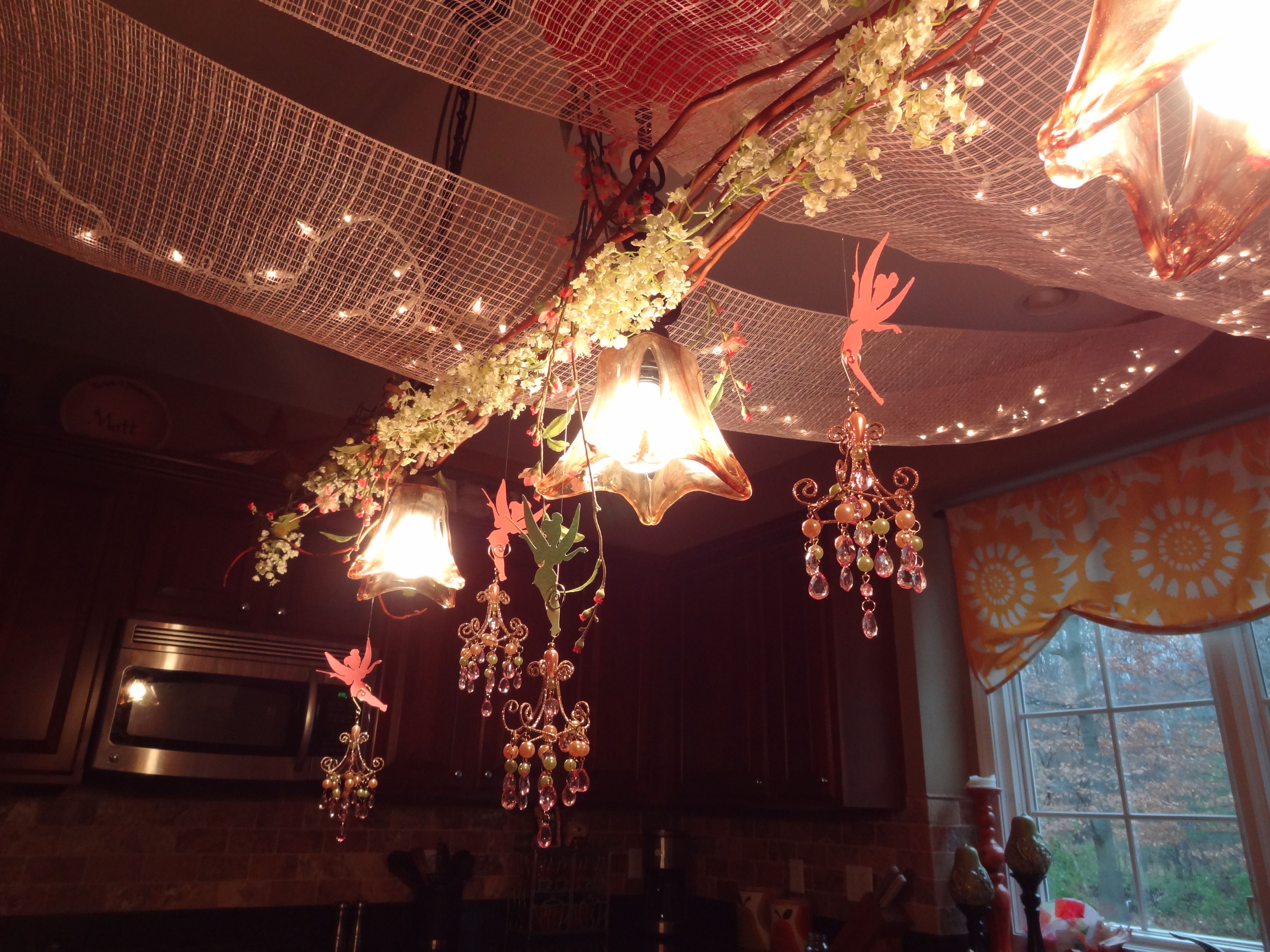 Little Fairies Dangling from Kitchen Chandelier