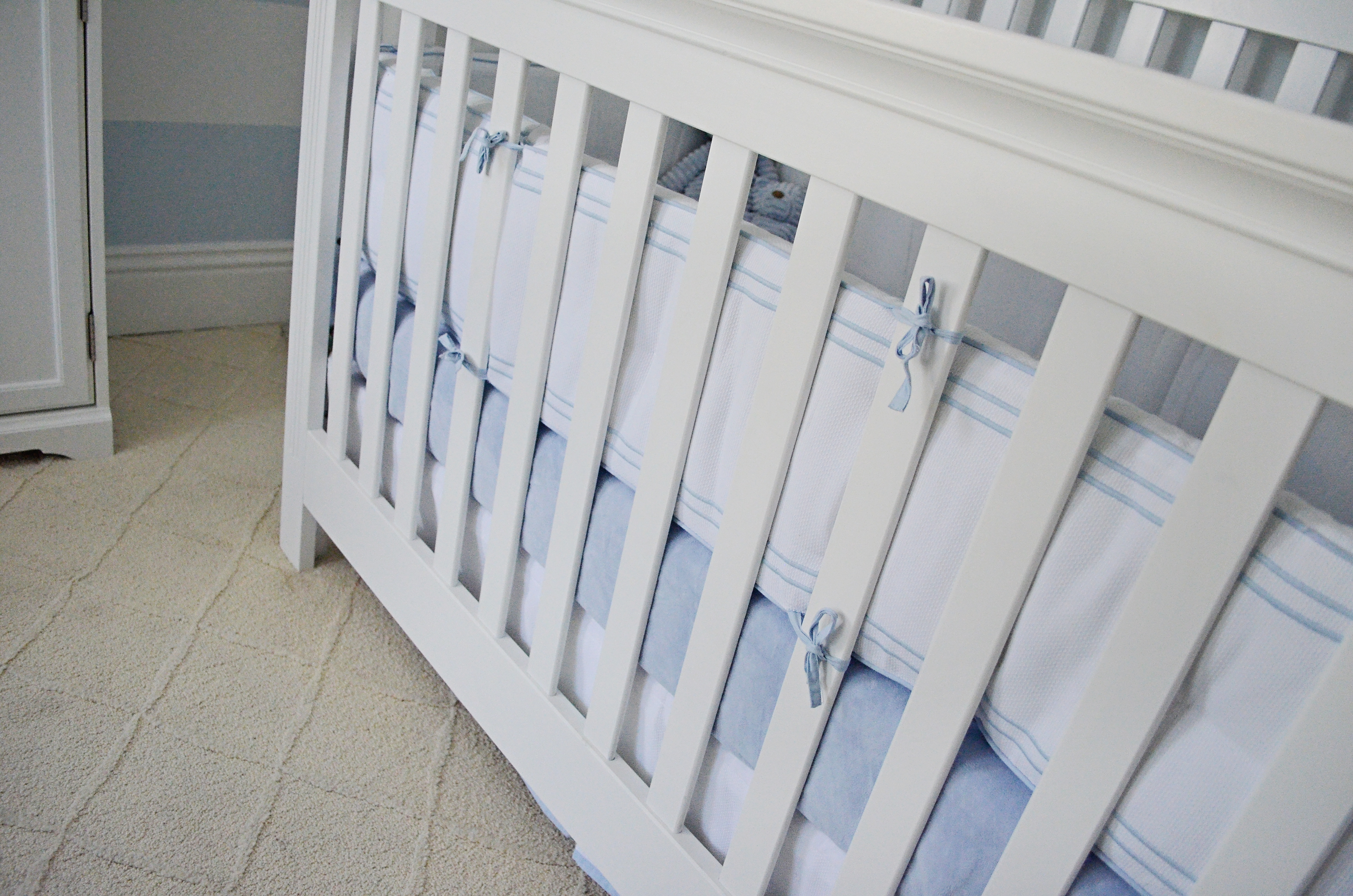 White Crib Bumper with Blue Stripes