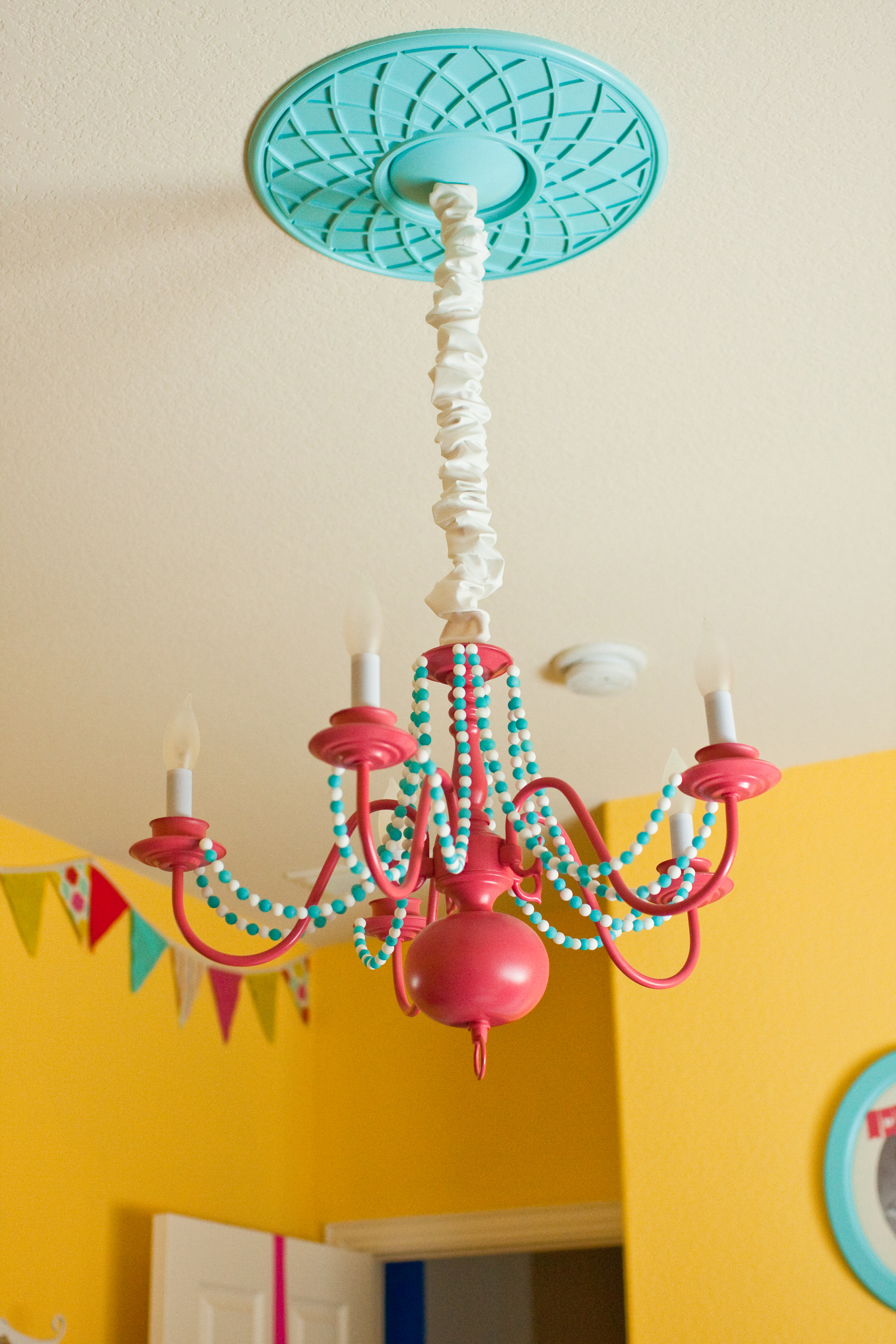 DIY Chandelier Spray Painted Pink with Beads Added