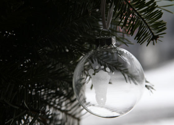 baby's first christmas glass ornament