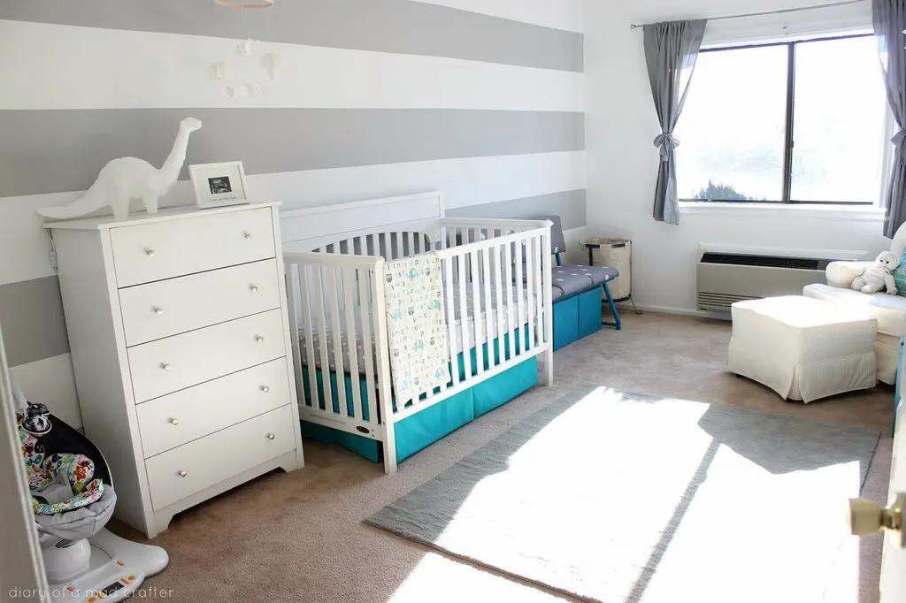 Horizontal Stripes Accent Wall in this Modern Nursery