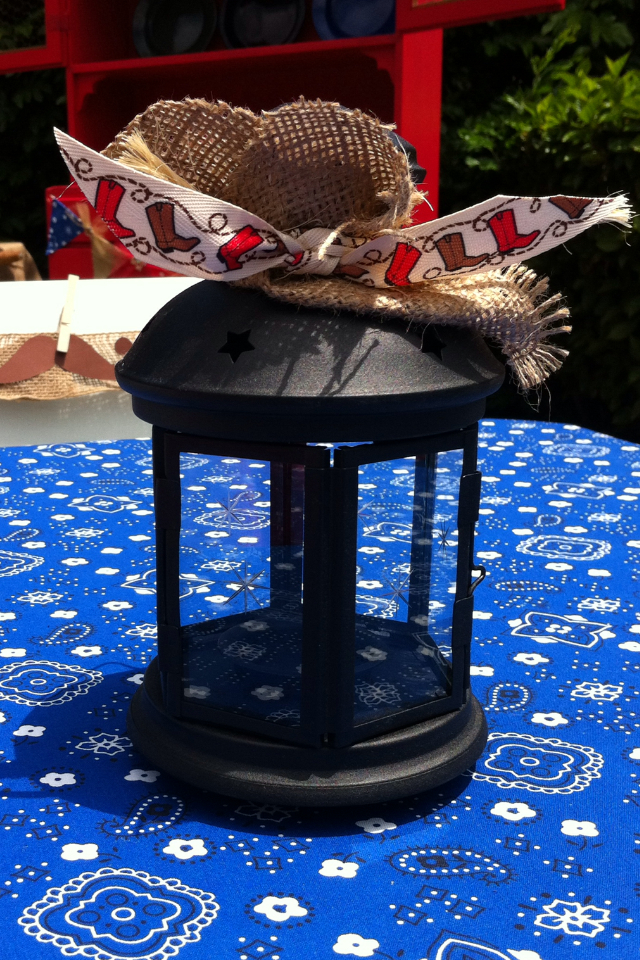 Black Lantern Centerpieces with Burlap, Ribbon, and Twine.