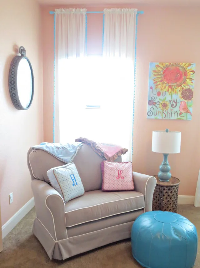 Upholstered Glider with Turquoise Ottoman