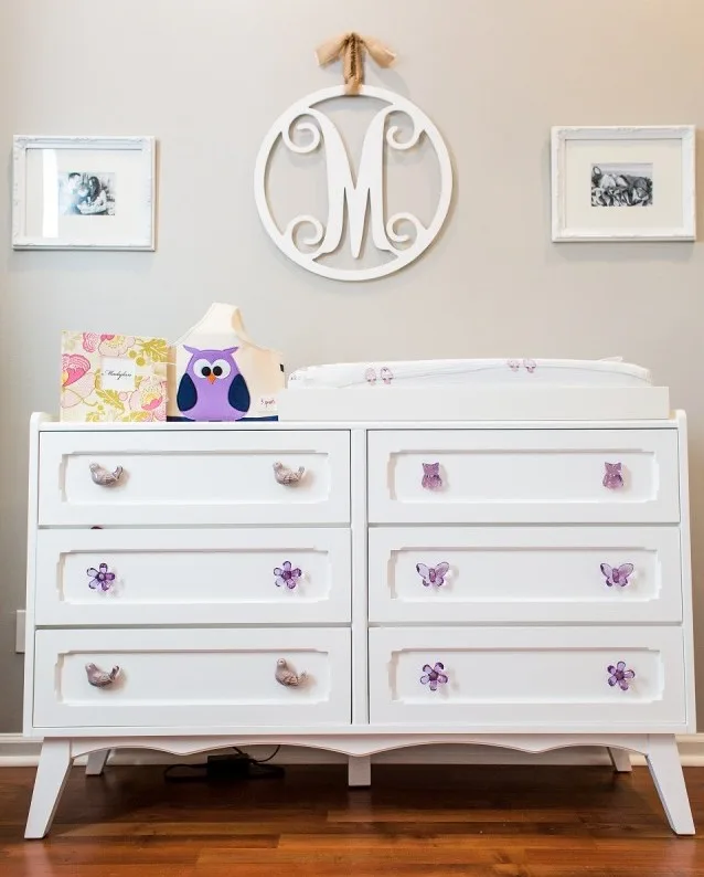 White Dresser with Mismatched Purple Knobs
