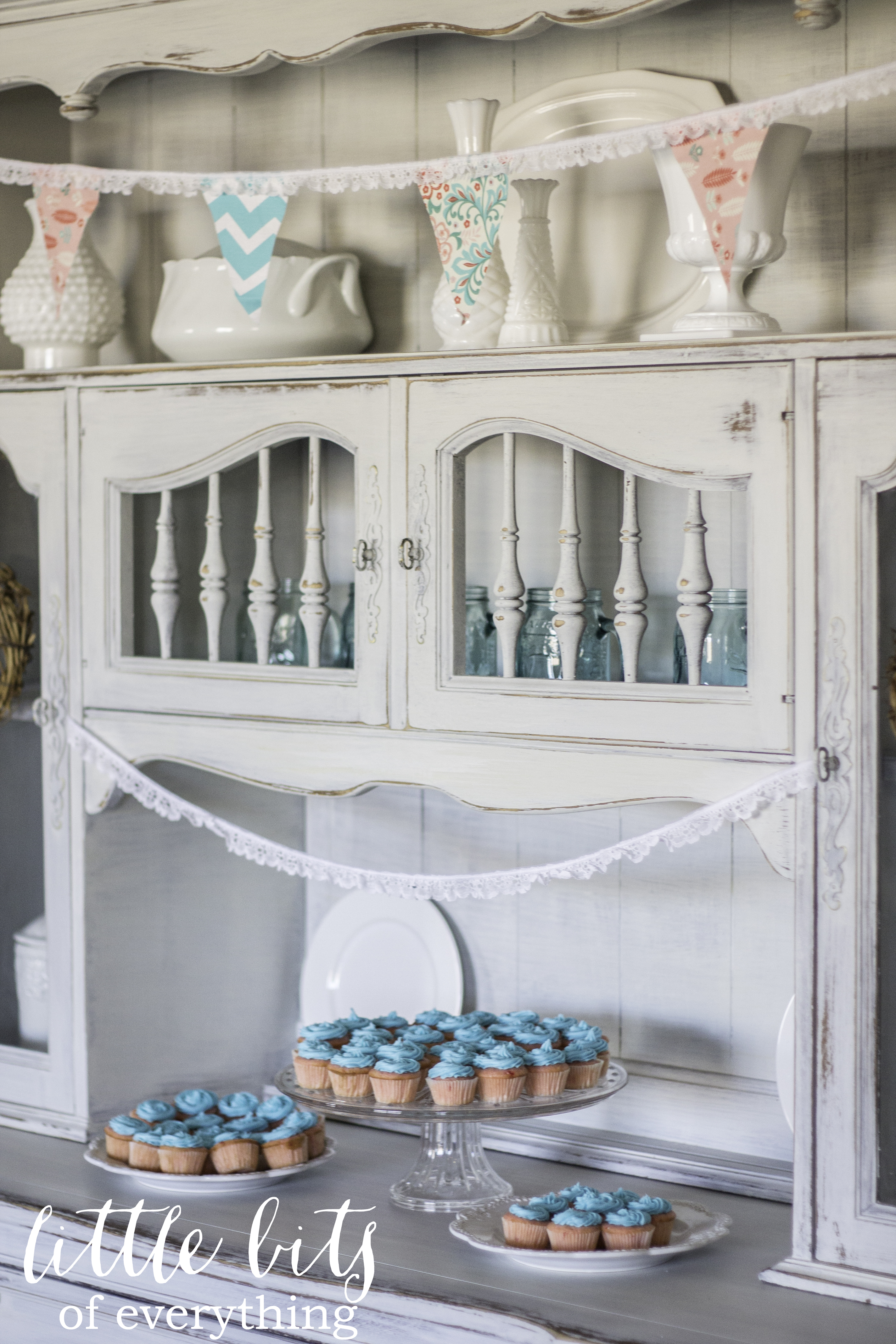 Vintage Hutch Backdrop for this Aqua and Coral Baby Shower