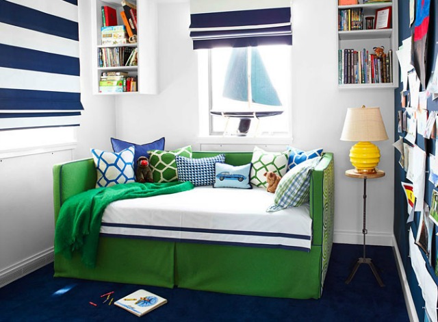Blue and White Bedroom with Green Trundle Bed