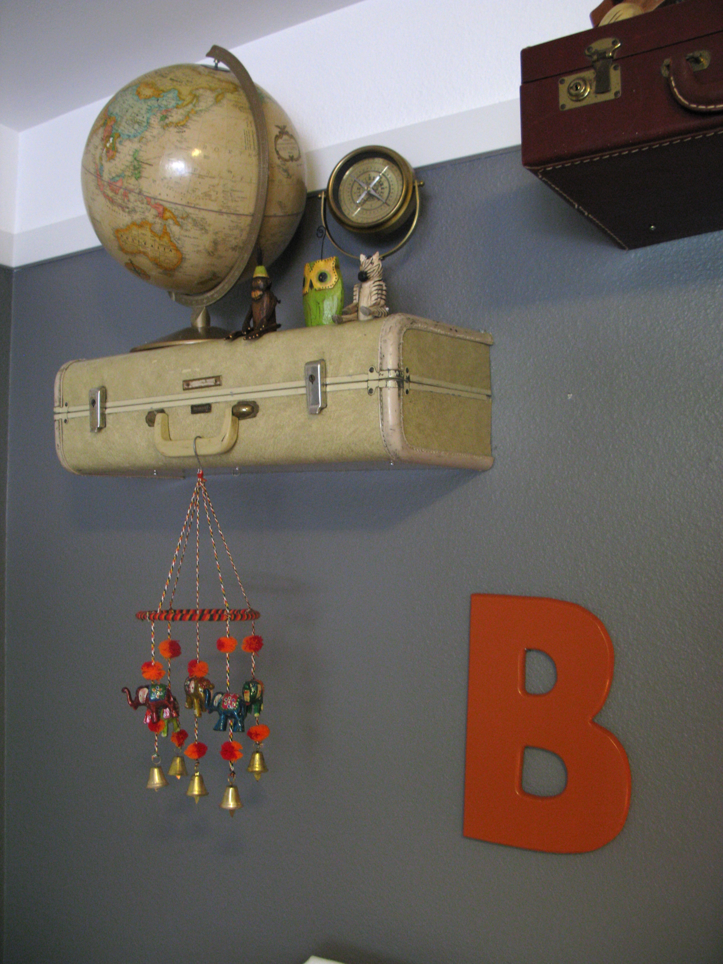 Vintage Globe Accent on Vintage Suitcase Shelves