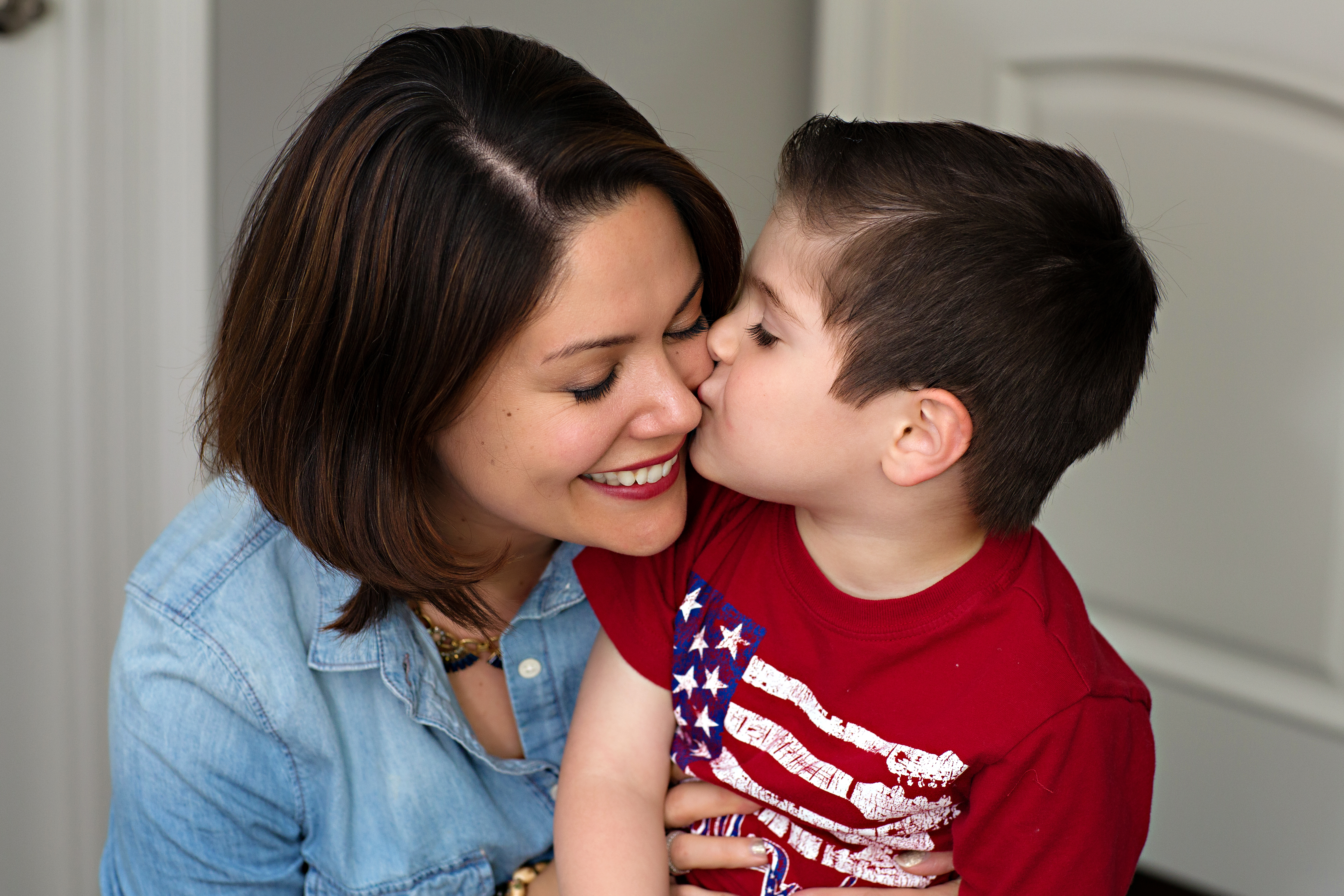 Mother and Son Kiss