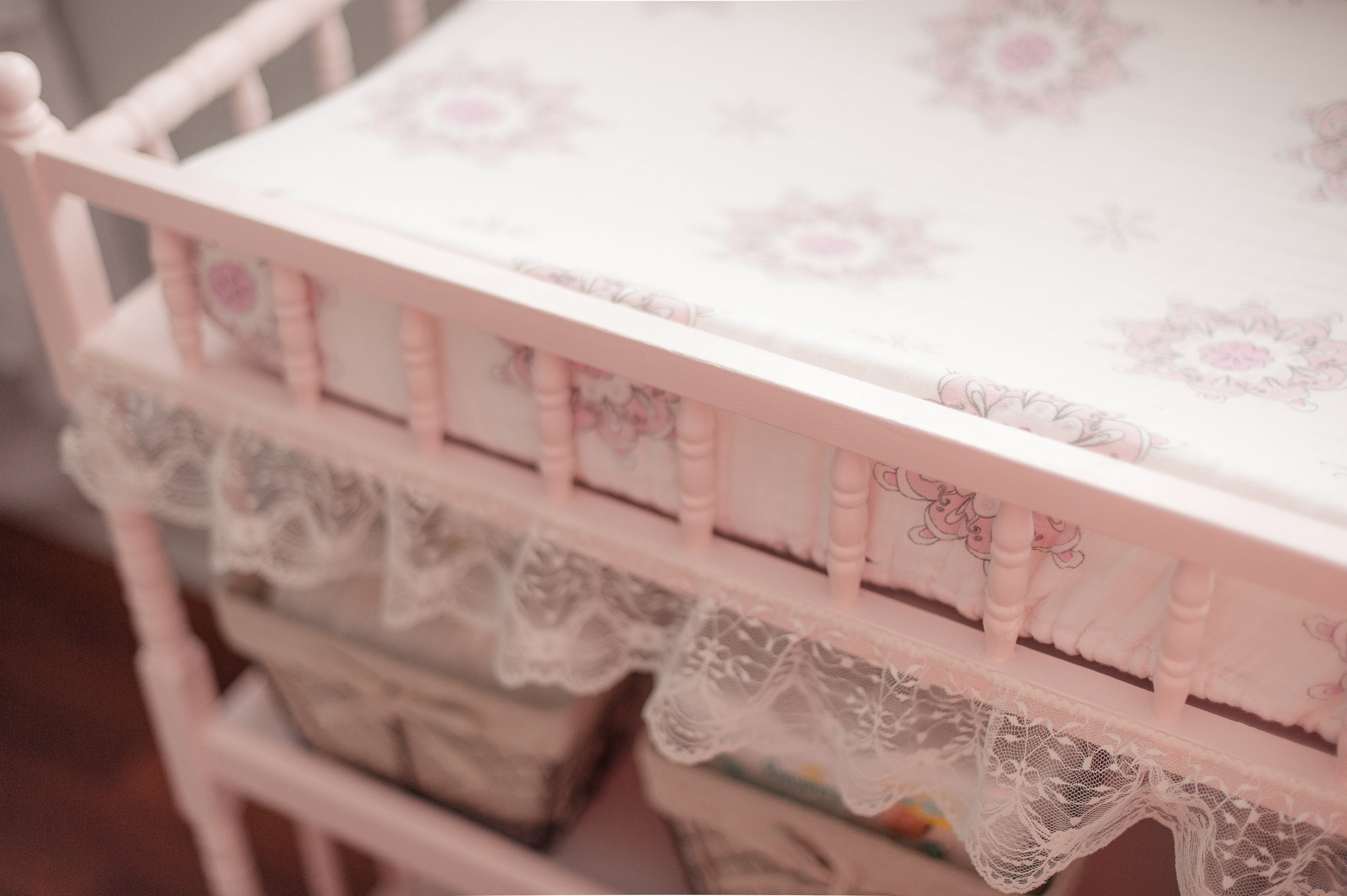 Changing Table Painted Pink and Hot Glued Frilly Lace