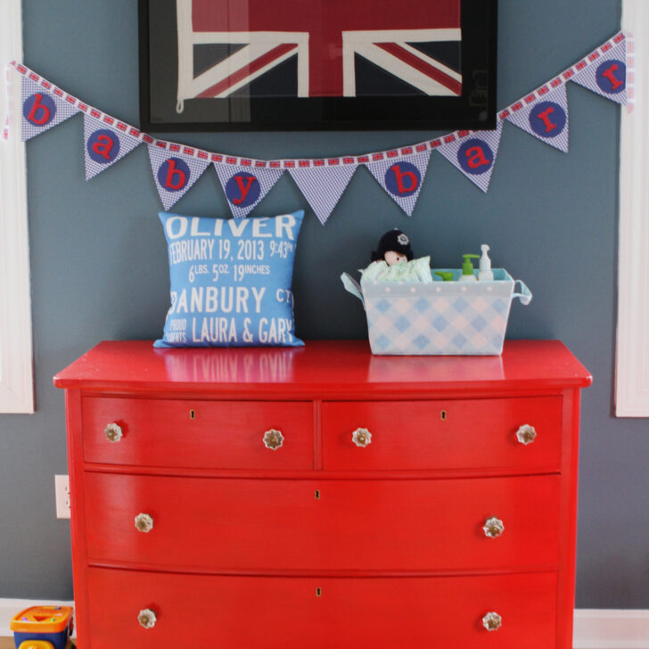 Bright Red Dresser in this British Nursery