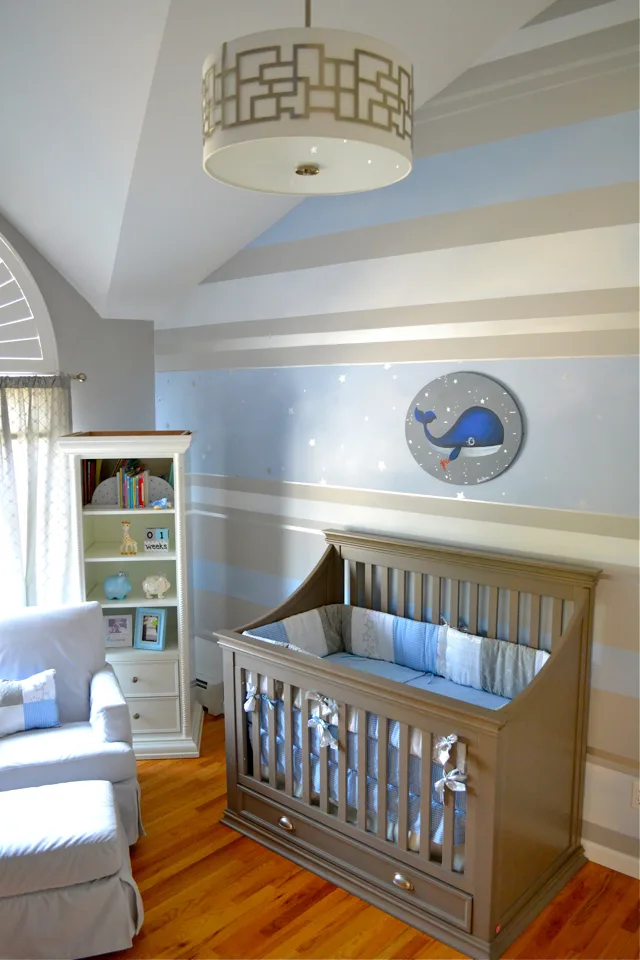 Nursery with Striped Accent Wall