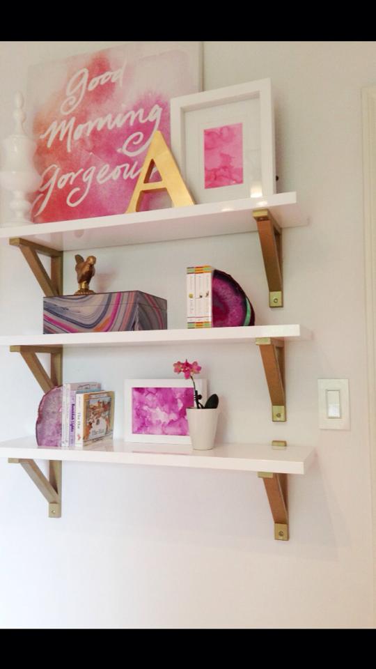 White and Gold Shelves with Fuchsia Accents