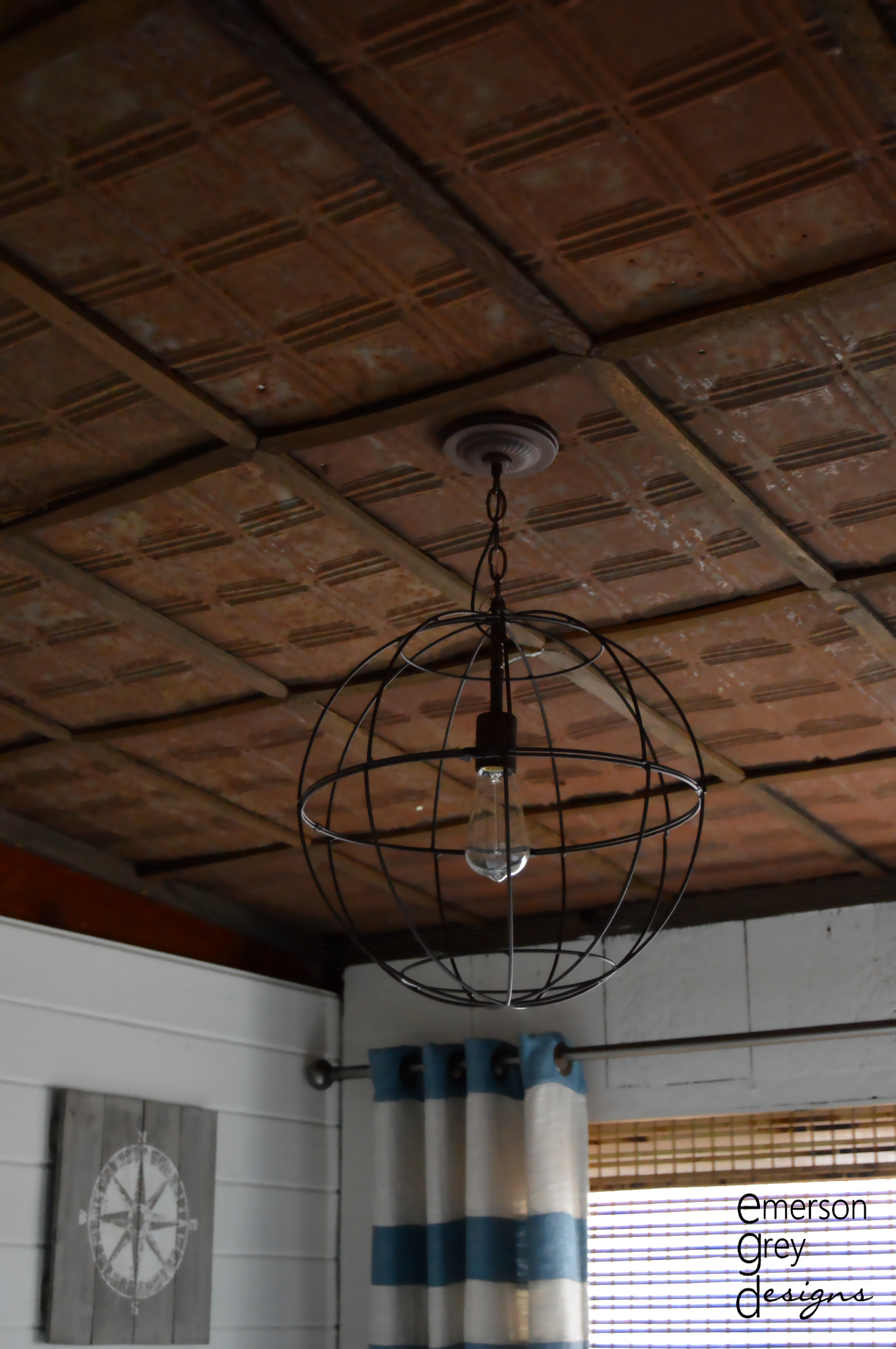 Globe Pendant on Tin Ceiling