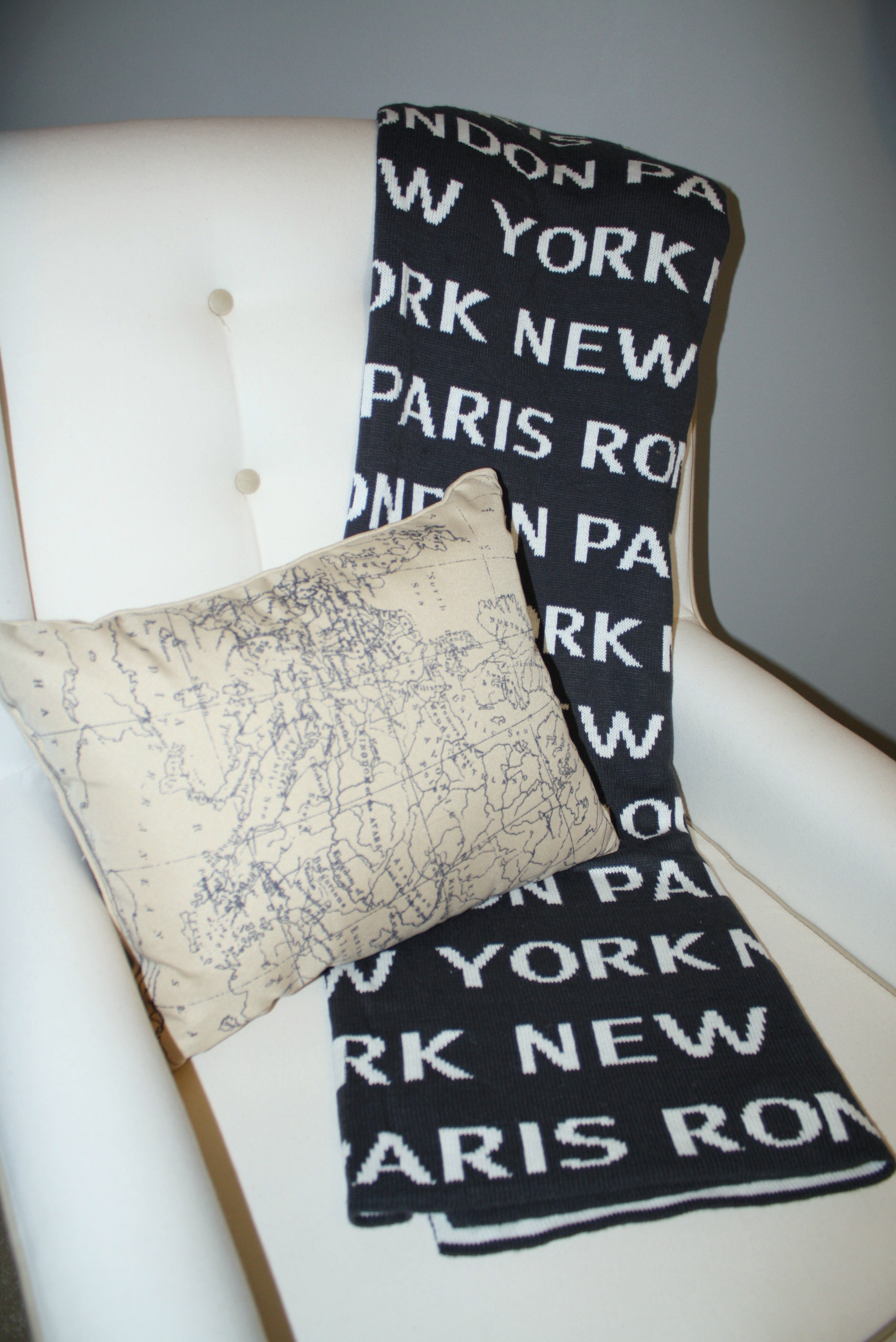 Map Pillow and Cities Throw Blanket for this Travel Themed Nursery