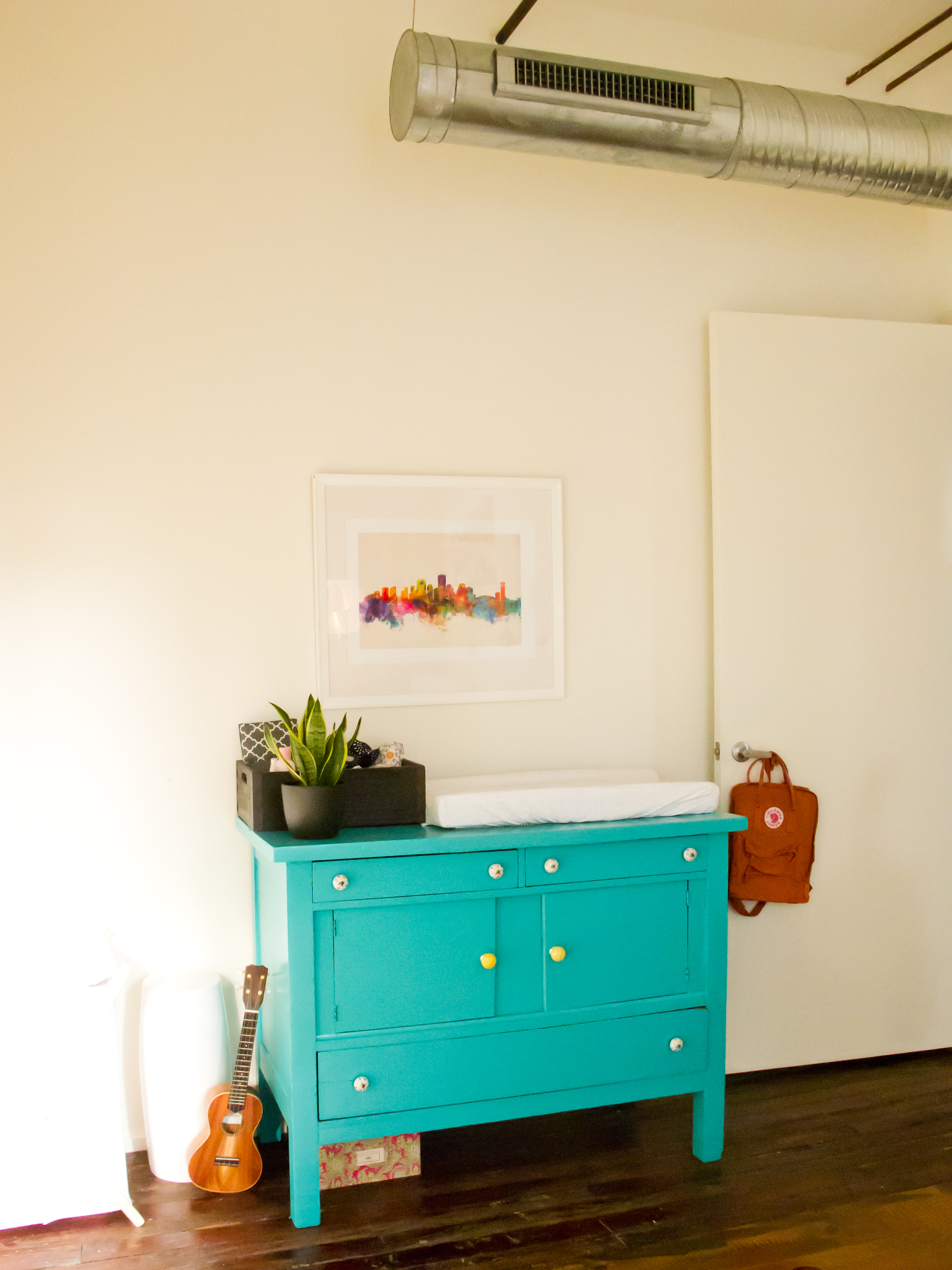 Teal Changing Table in this Bright, Colorful Nursery