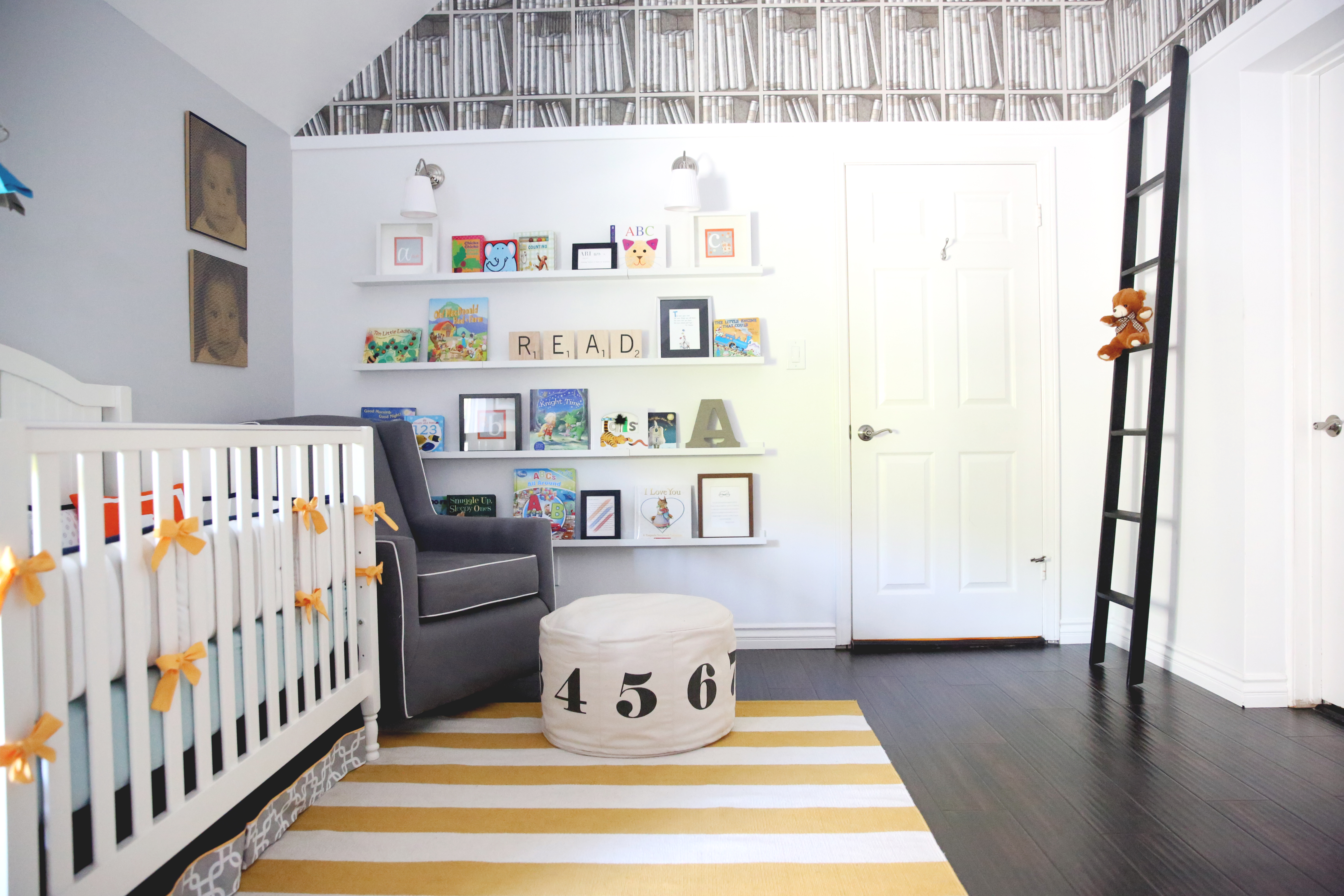 Library Themed Wallpaper and Library Ladder in this Library Nursery