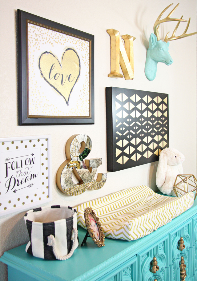 Black and Gold Gallery Wall in this Turquoise Dresser in this Black, White, Gold and Aqua Nursery