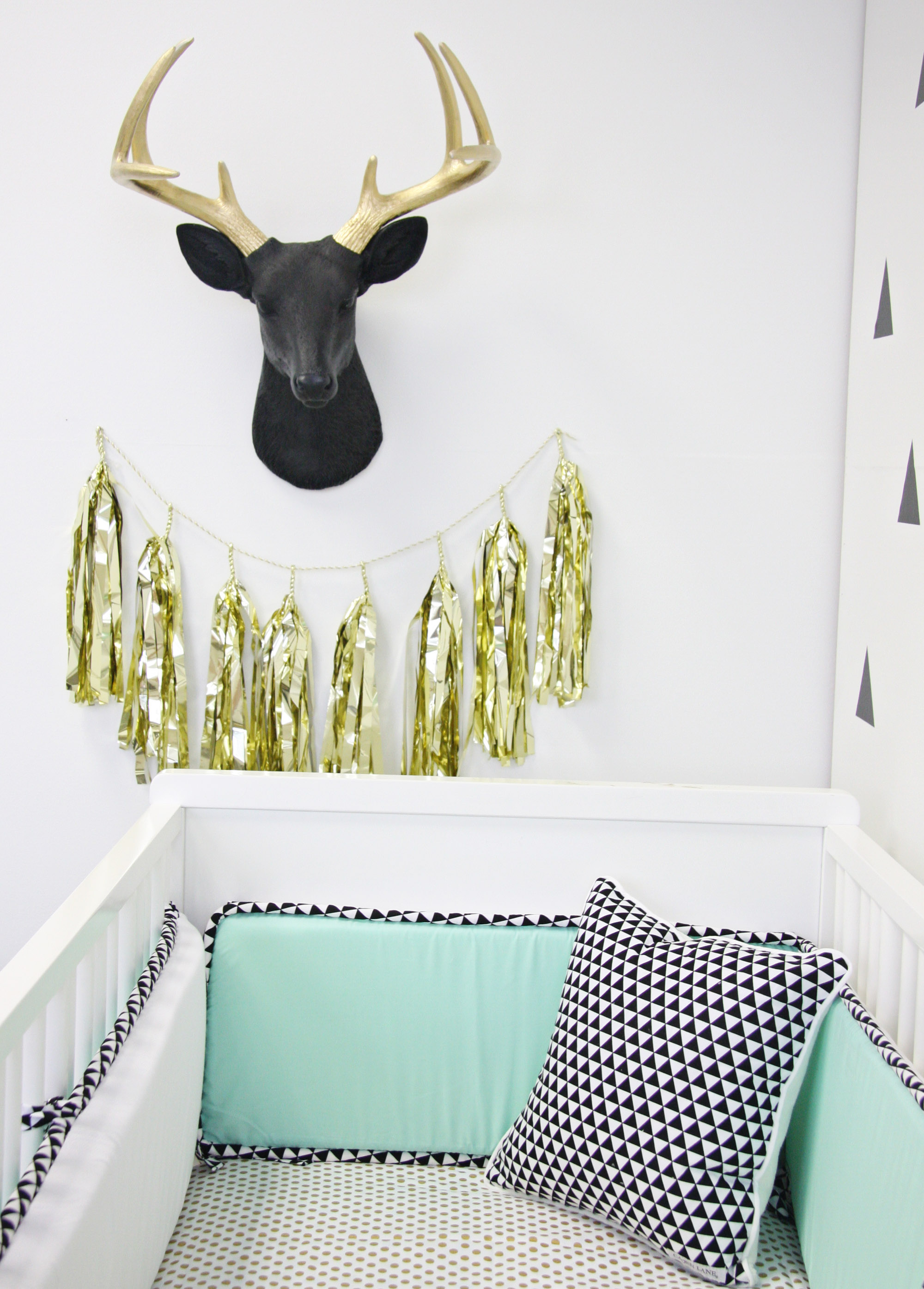 Black and Gold Deer Head in this Modern Mint Nursery