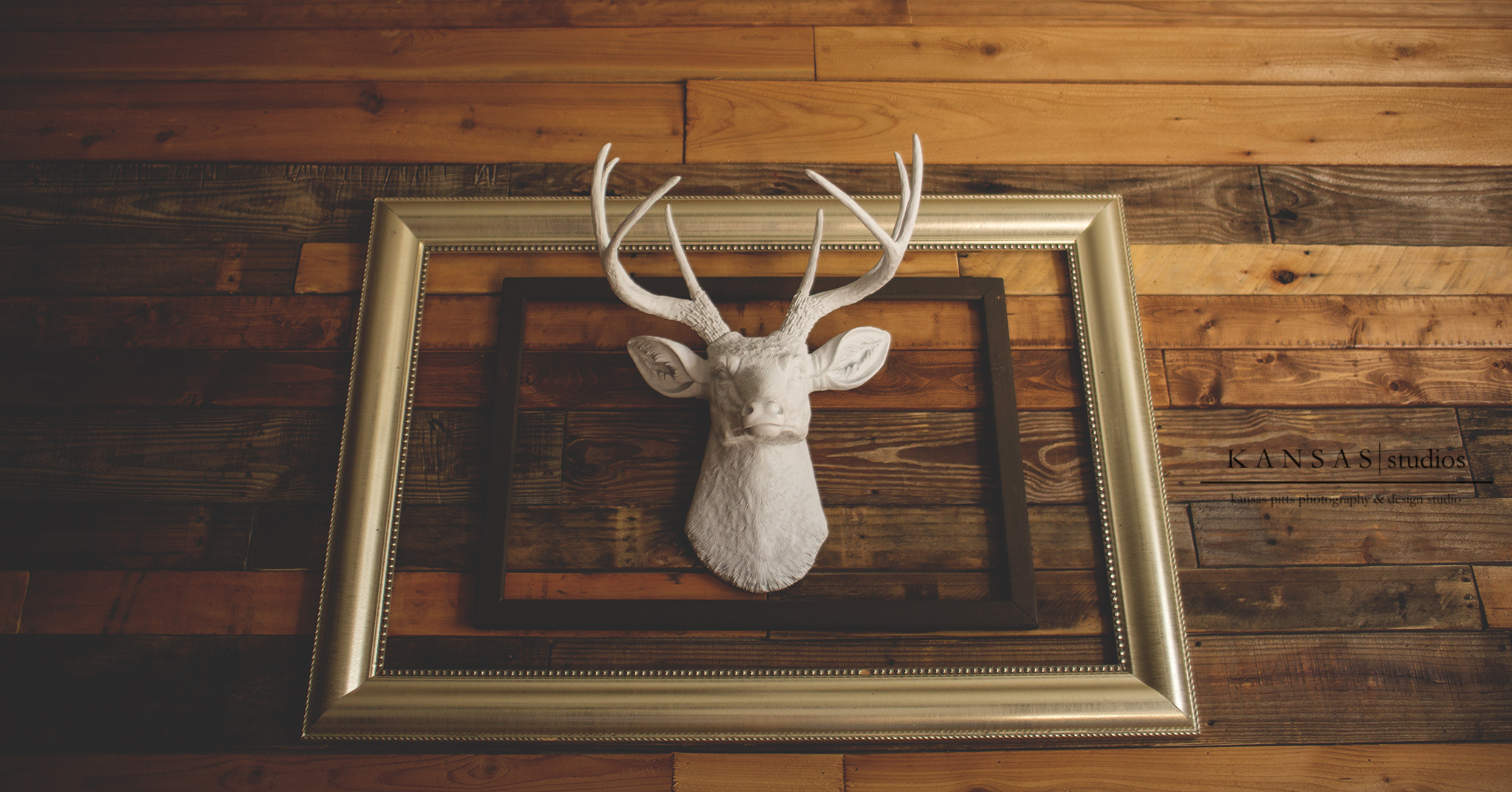Faux Deer Head Framed on Wooden Pallet Wall