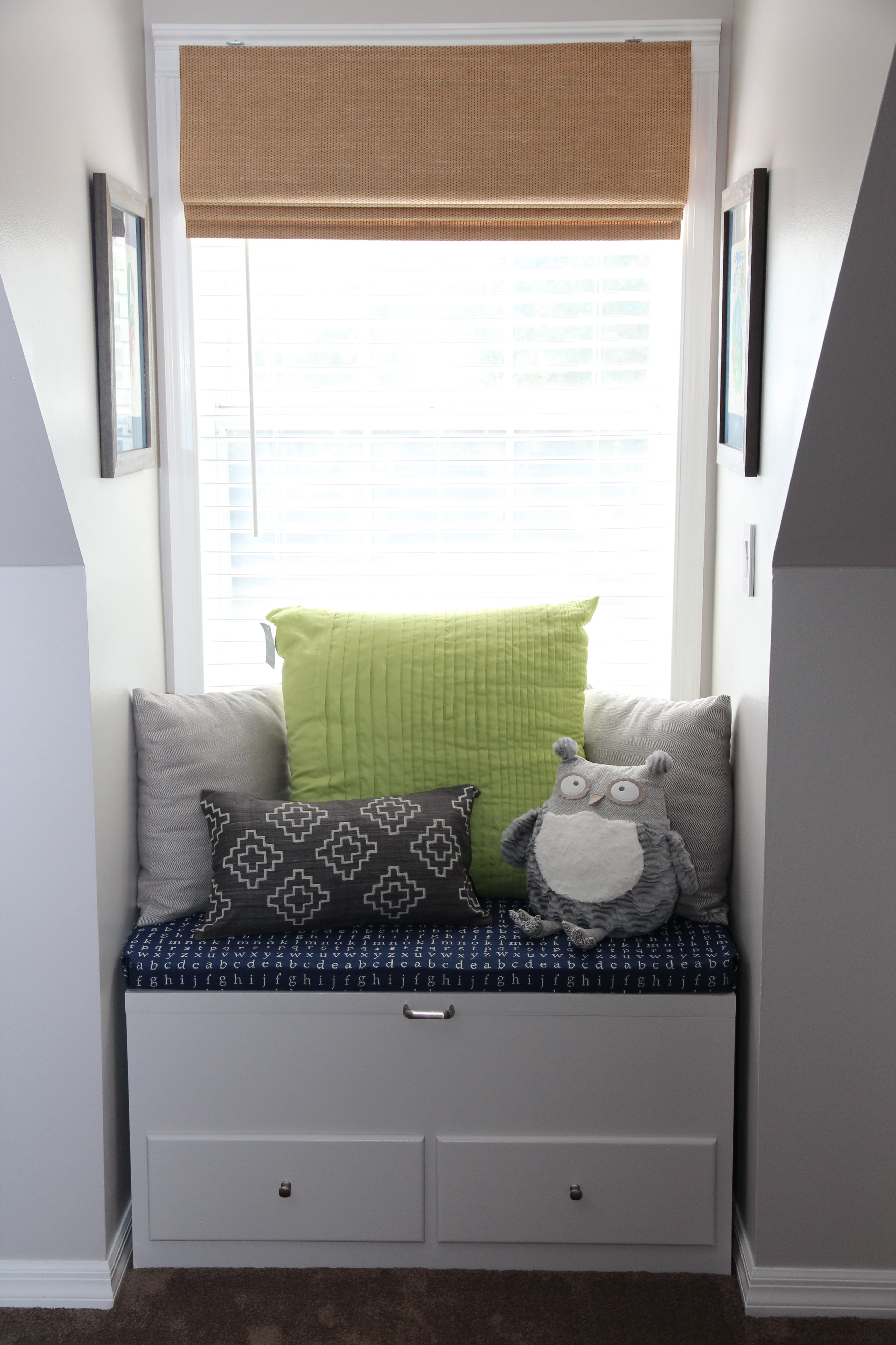 Cozy Window Bench in this Blue and Gray Nursery