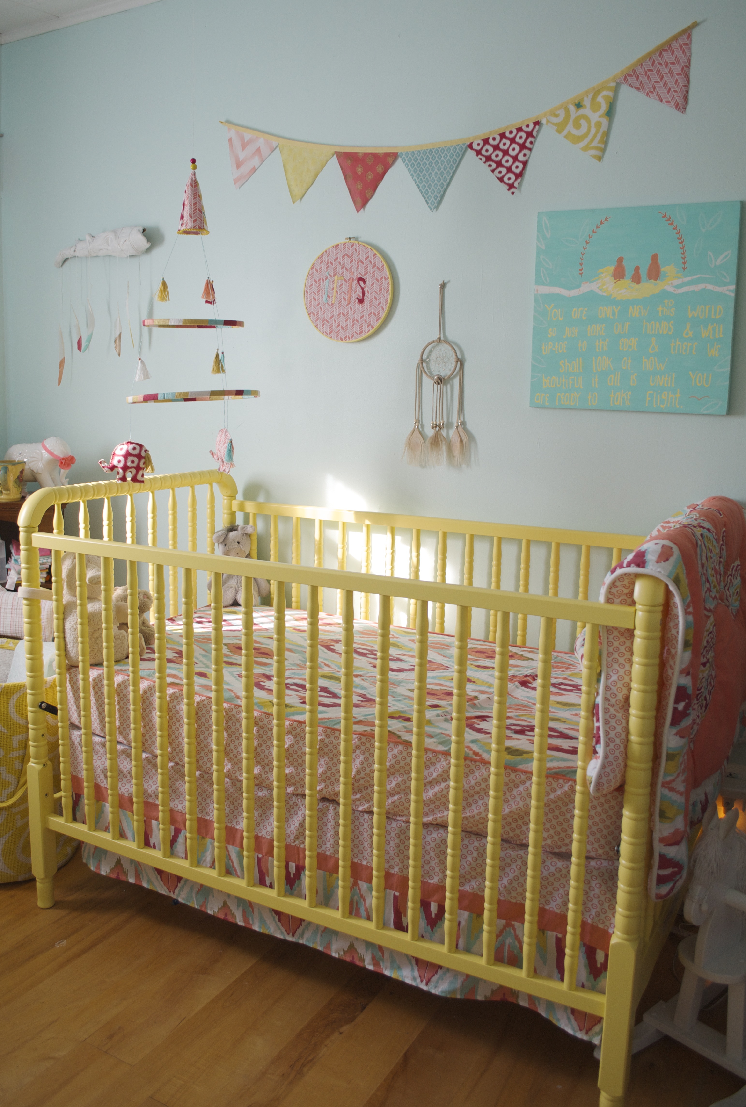 Yellow Jenny Lind Crib in this Colorful Boho Nursery