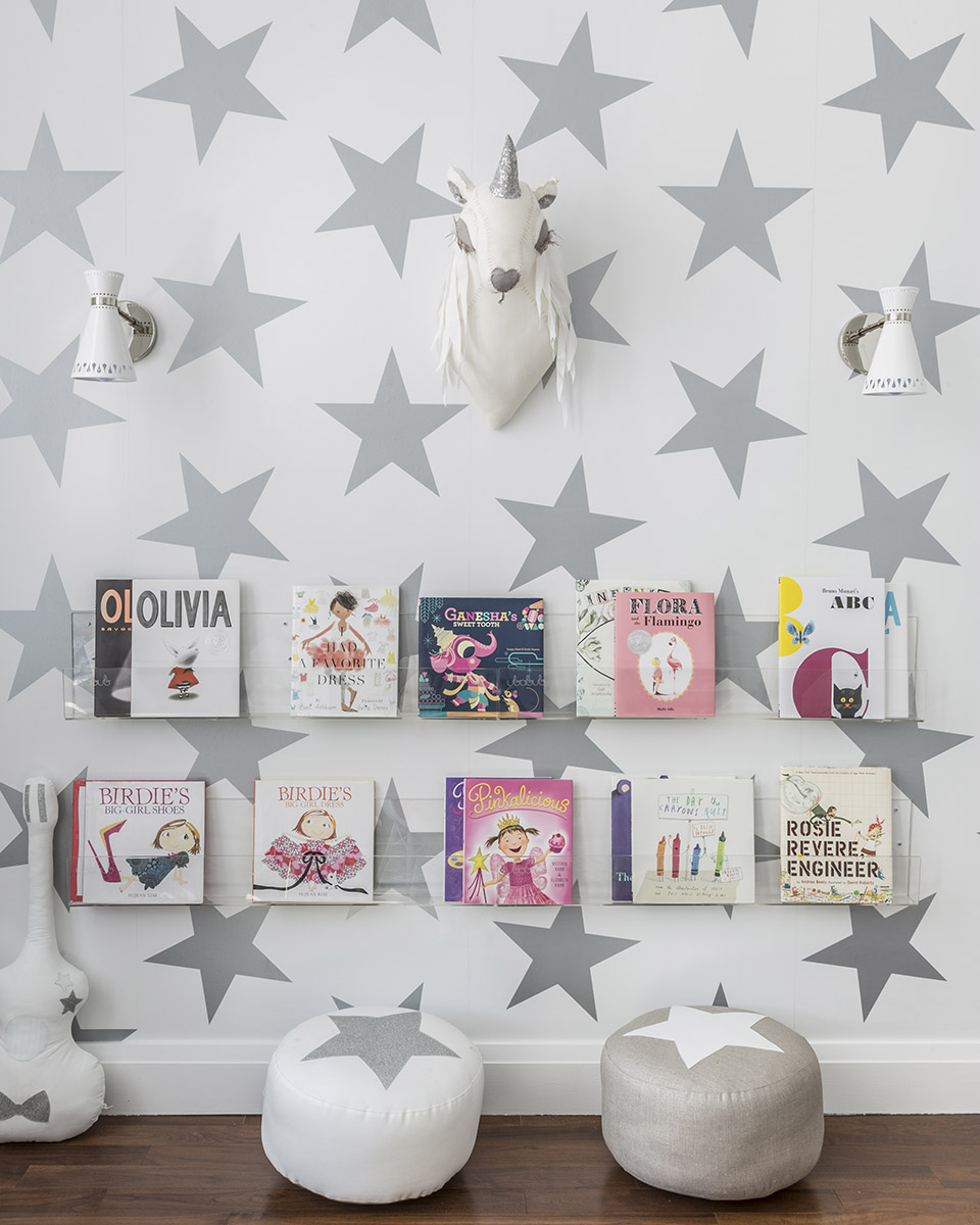 IKEA Clear Bookshelves and Star Poufs in this Lucky Star Playroom