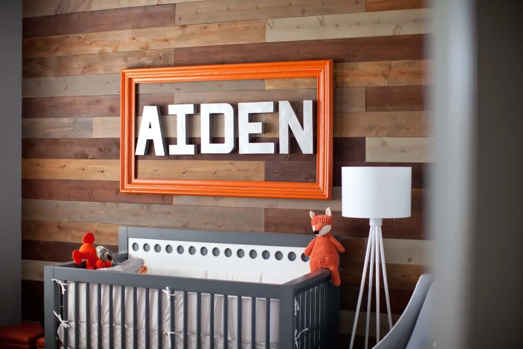 Modern Orange and Gray Nursery with Wood Accent Wall - Project Nursery