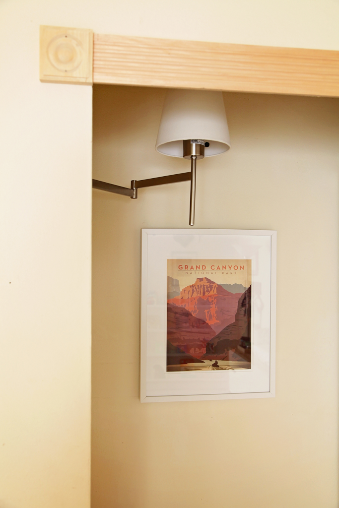 Reading Nook with Swing Arm Sconce and Grand Canyon Poster