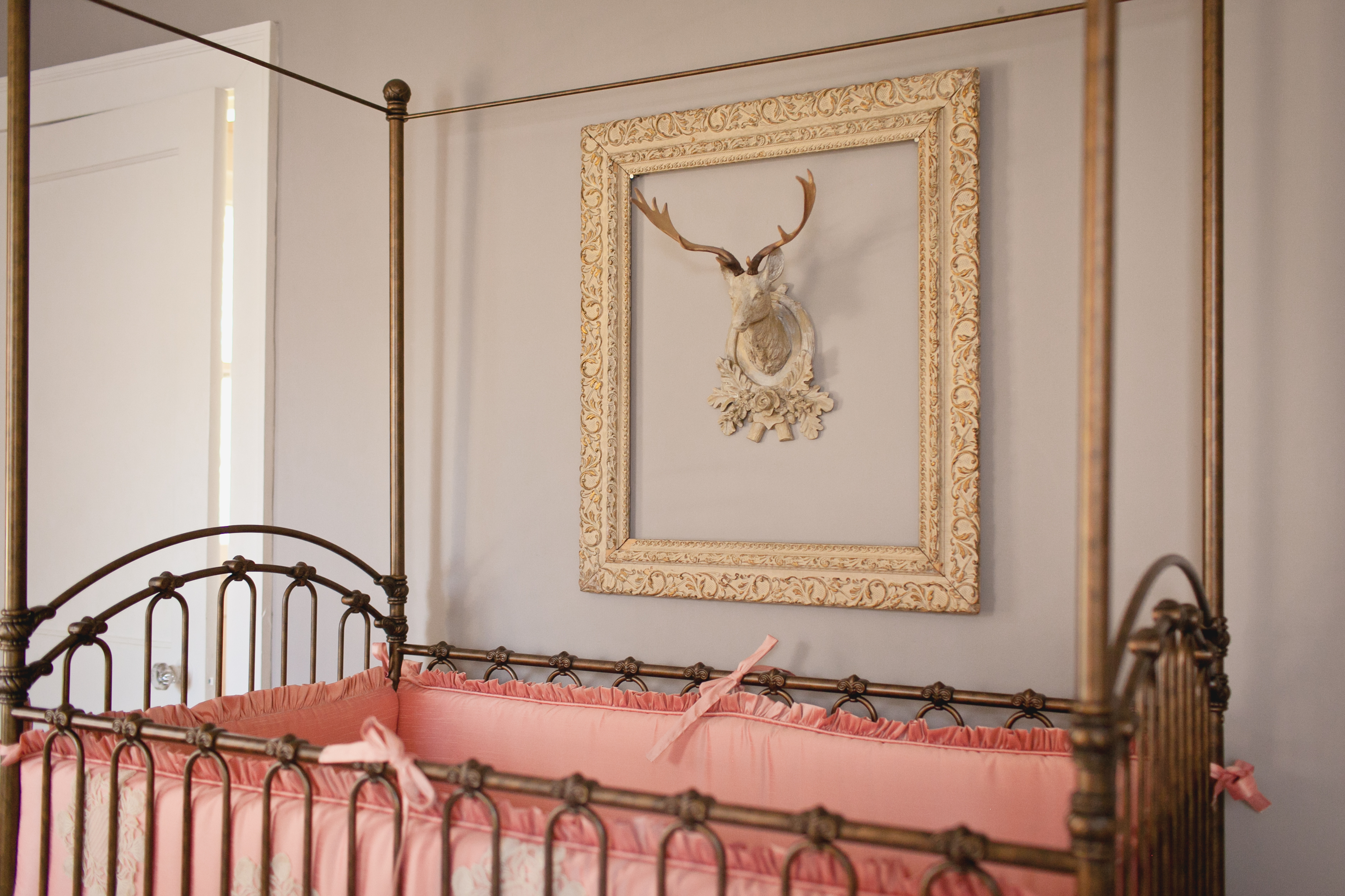 Faux Taxidermy Framed over Vintage Canopy Crib