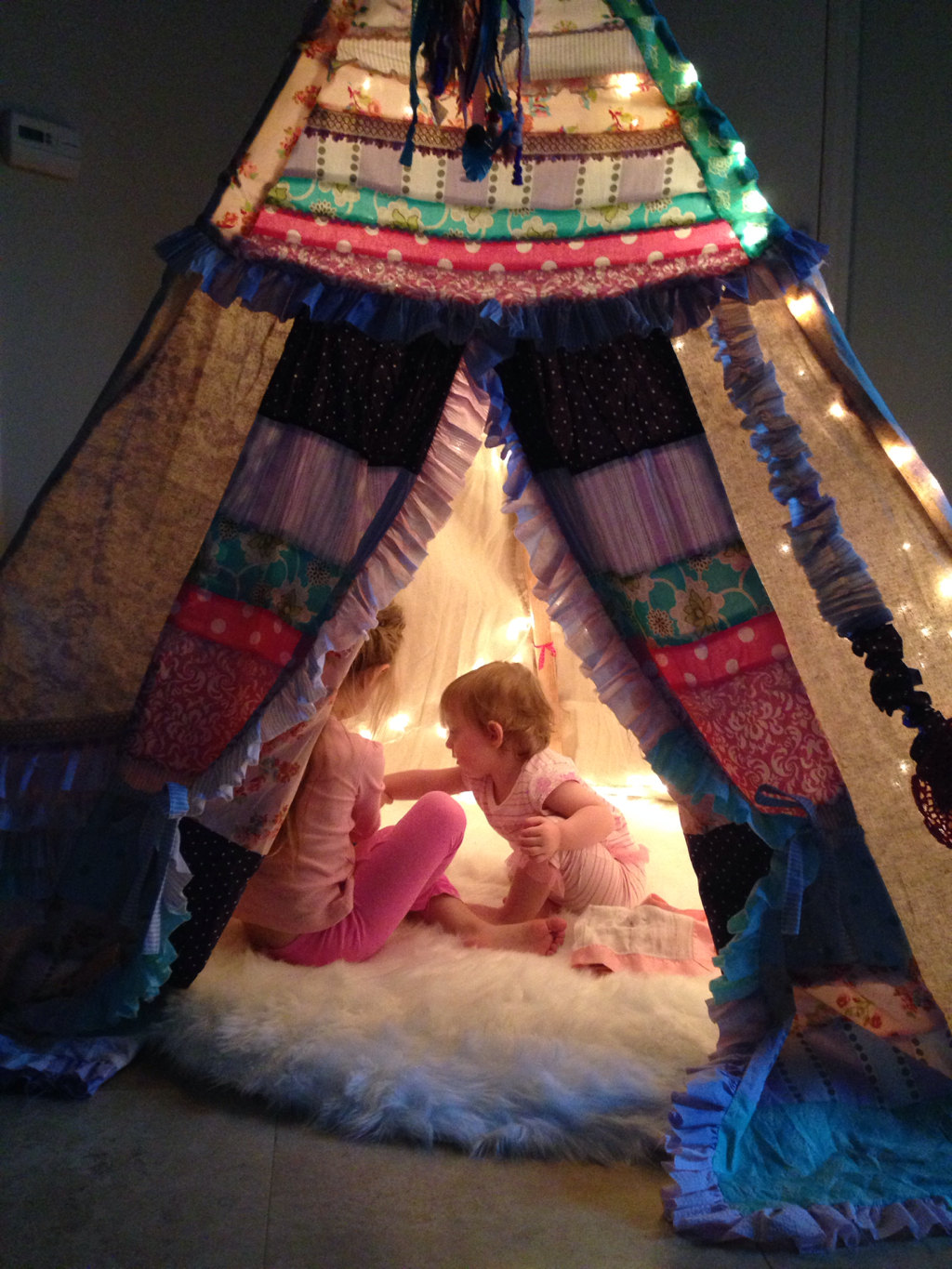 Bohemian Teepee with Faux Fur Rug from Etsy