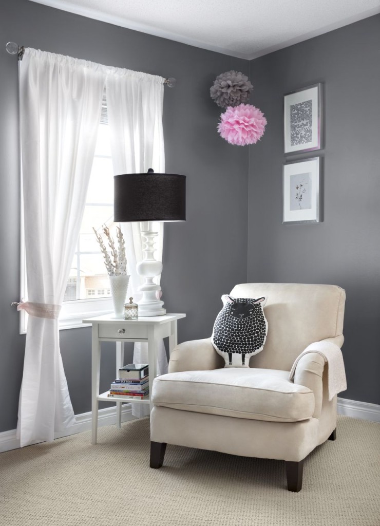 pink and gray nursery with dark furniture