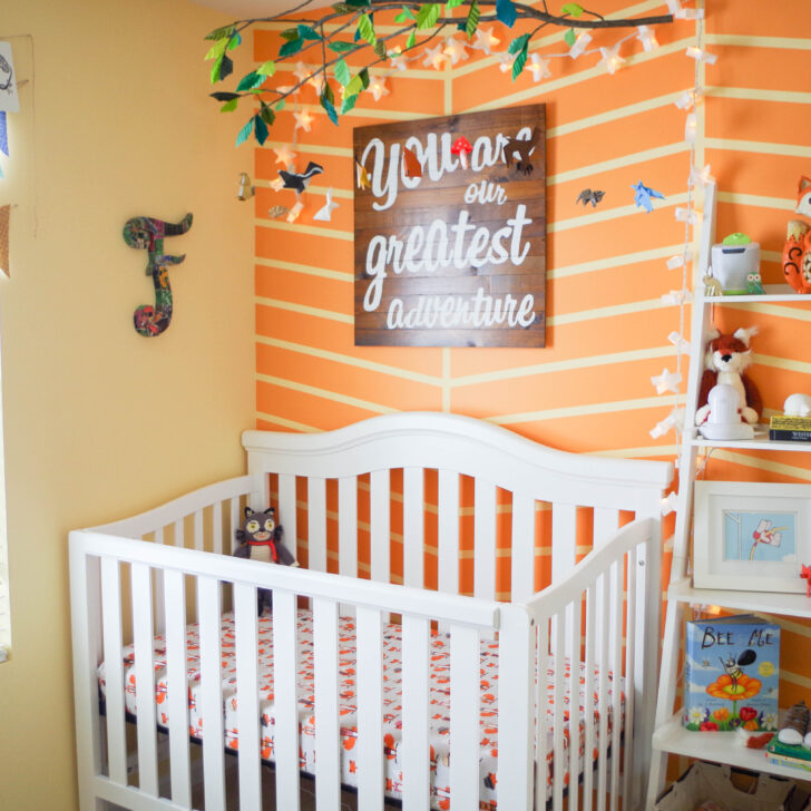 Orange Herringbone Accent Wall in this Colorful Woodland Nursery