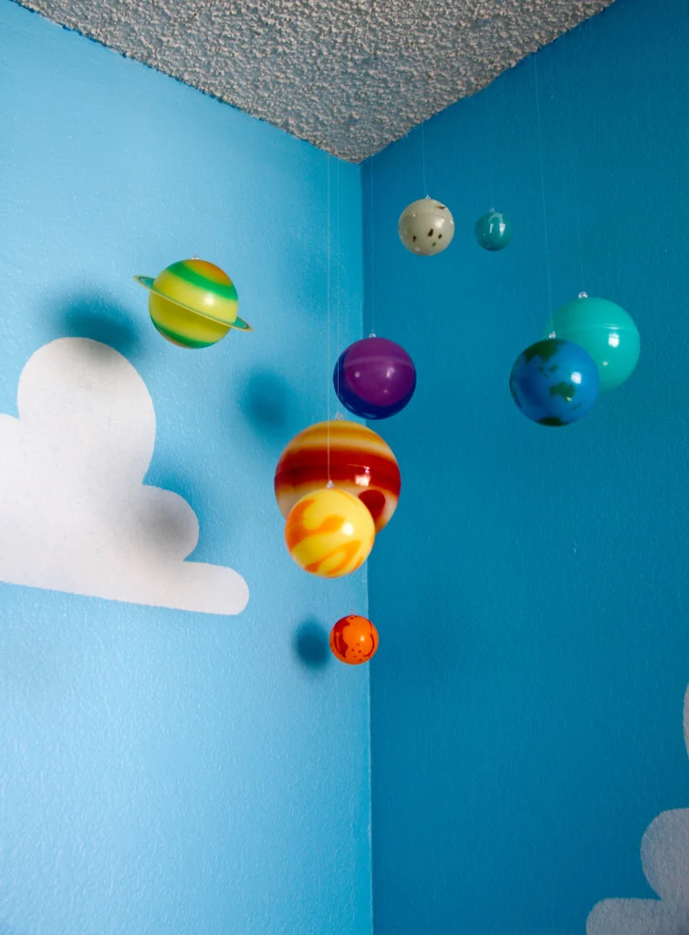 Solar System Mobile in Toy Story Themed Nursery - Project Nursery