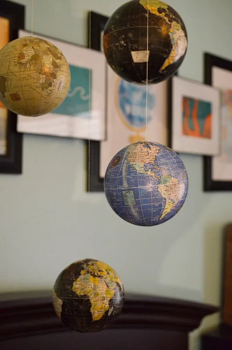 Hanging Globe Ornaments in Travel Themed Nursery - Project Nursery