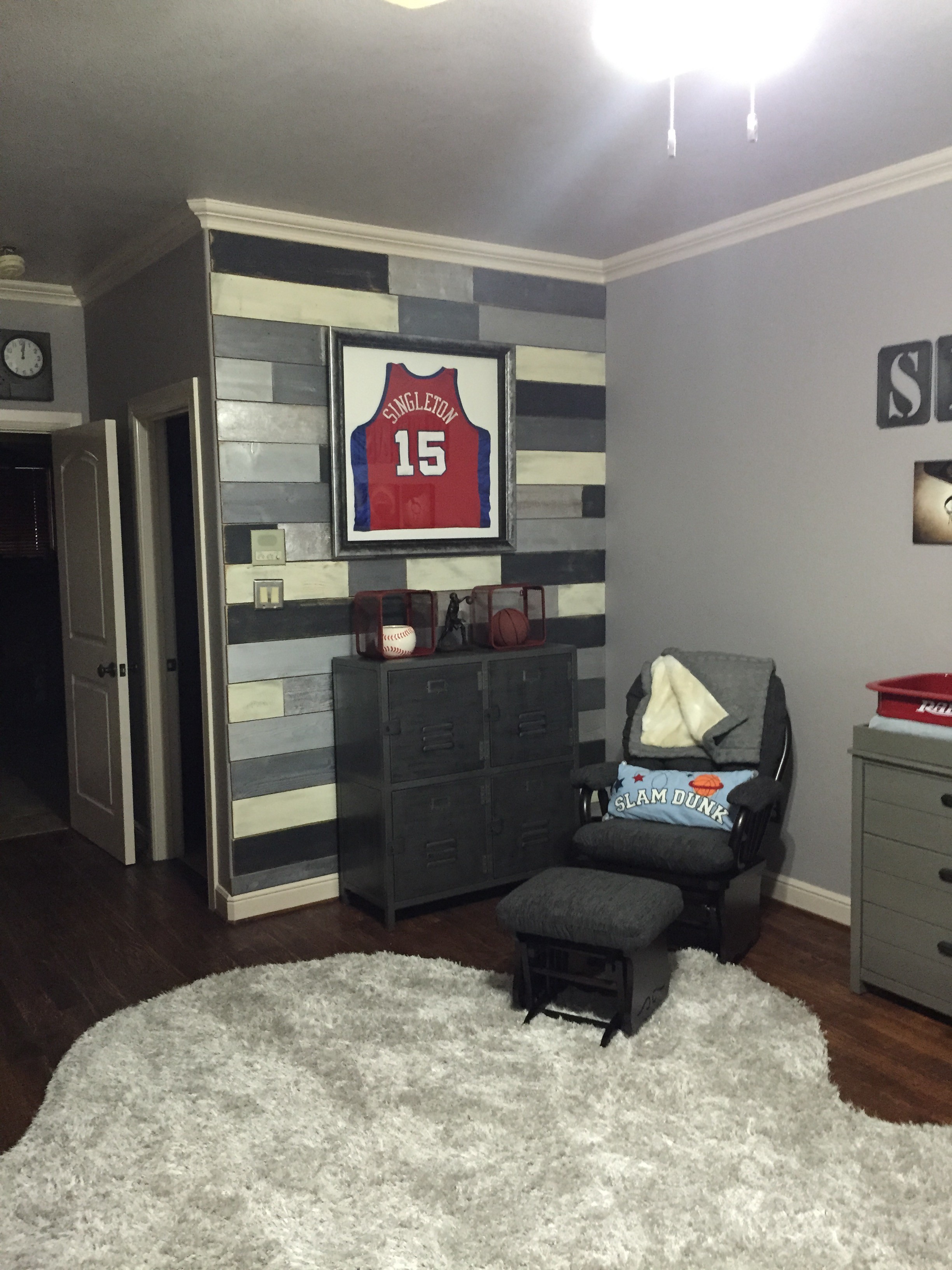 Metallic Wood Pallet Wall in this Basketball Nursery