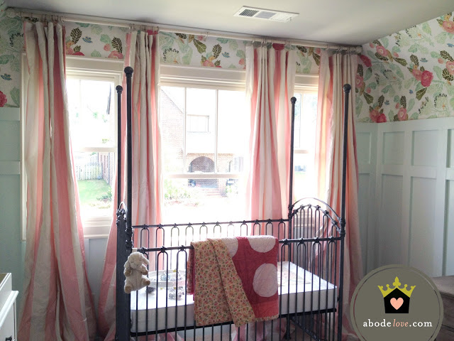 Girl's Nursery with Floral Wallpaper Accent