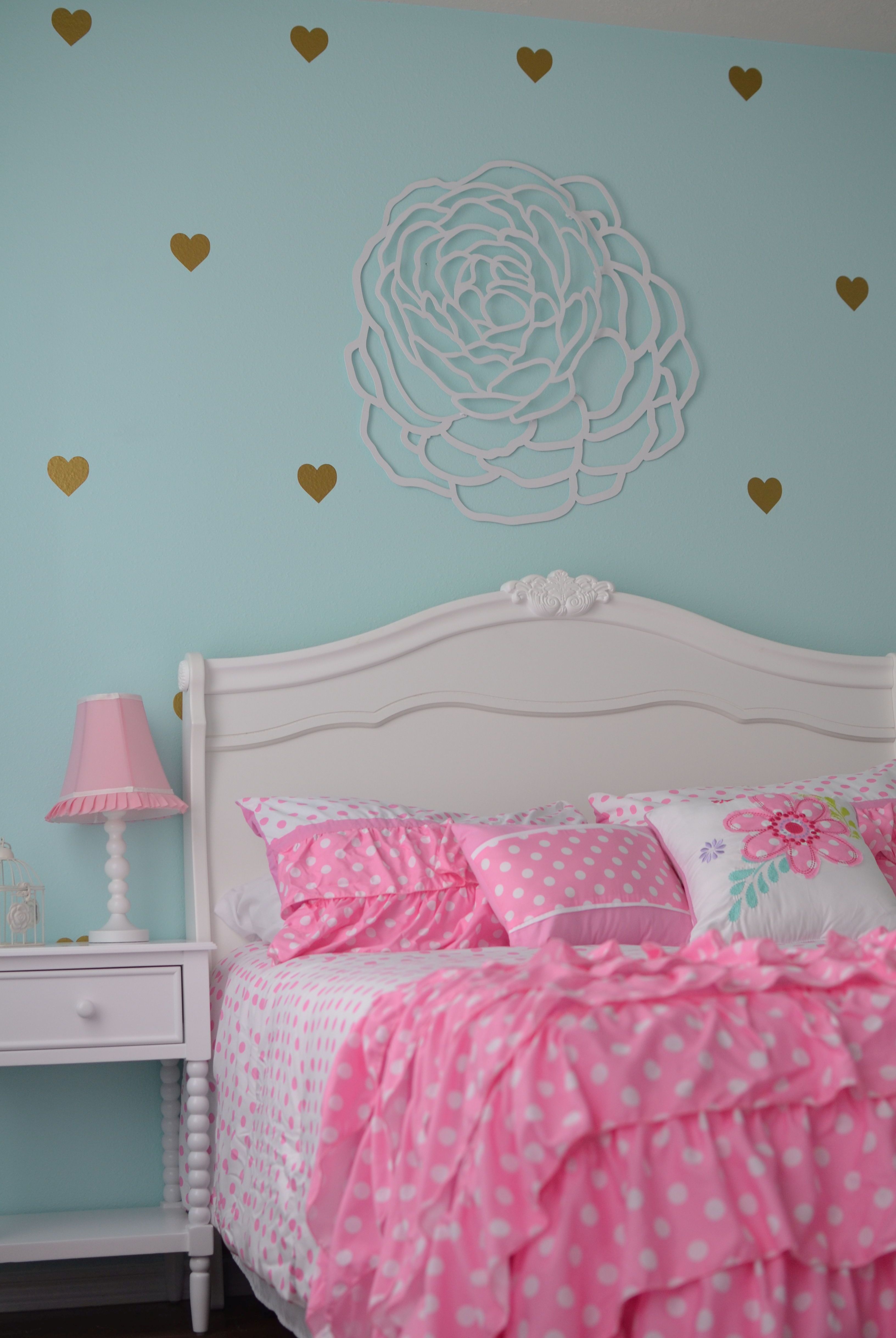 Teal pink and store gold bedroom