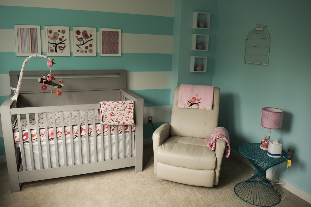 Blue and Pink Nursery with Striped Accent Wall