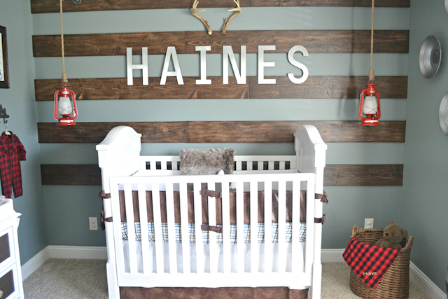 Wood Accent Wall in this Rustic Alaska Inspired Nursery